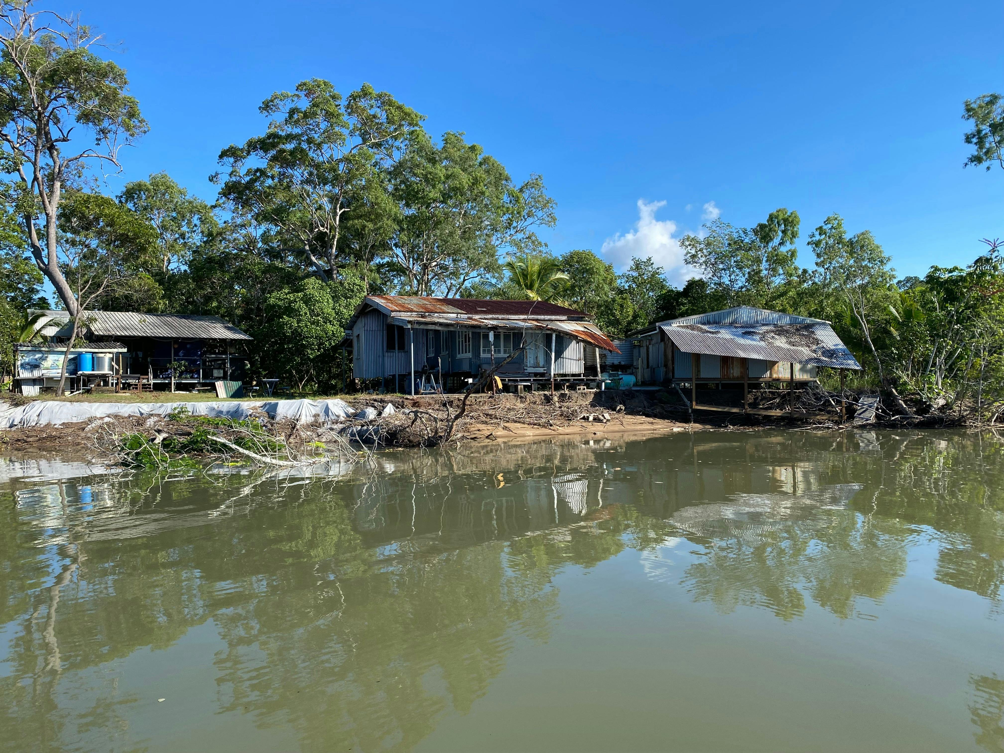 The historic Herbert river fishing shacks are slowly being reclaimed by the river