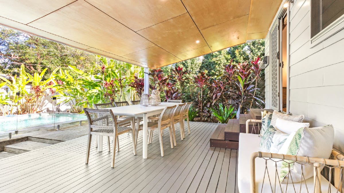 Balcony with outdoor dining and BBQ