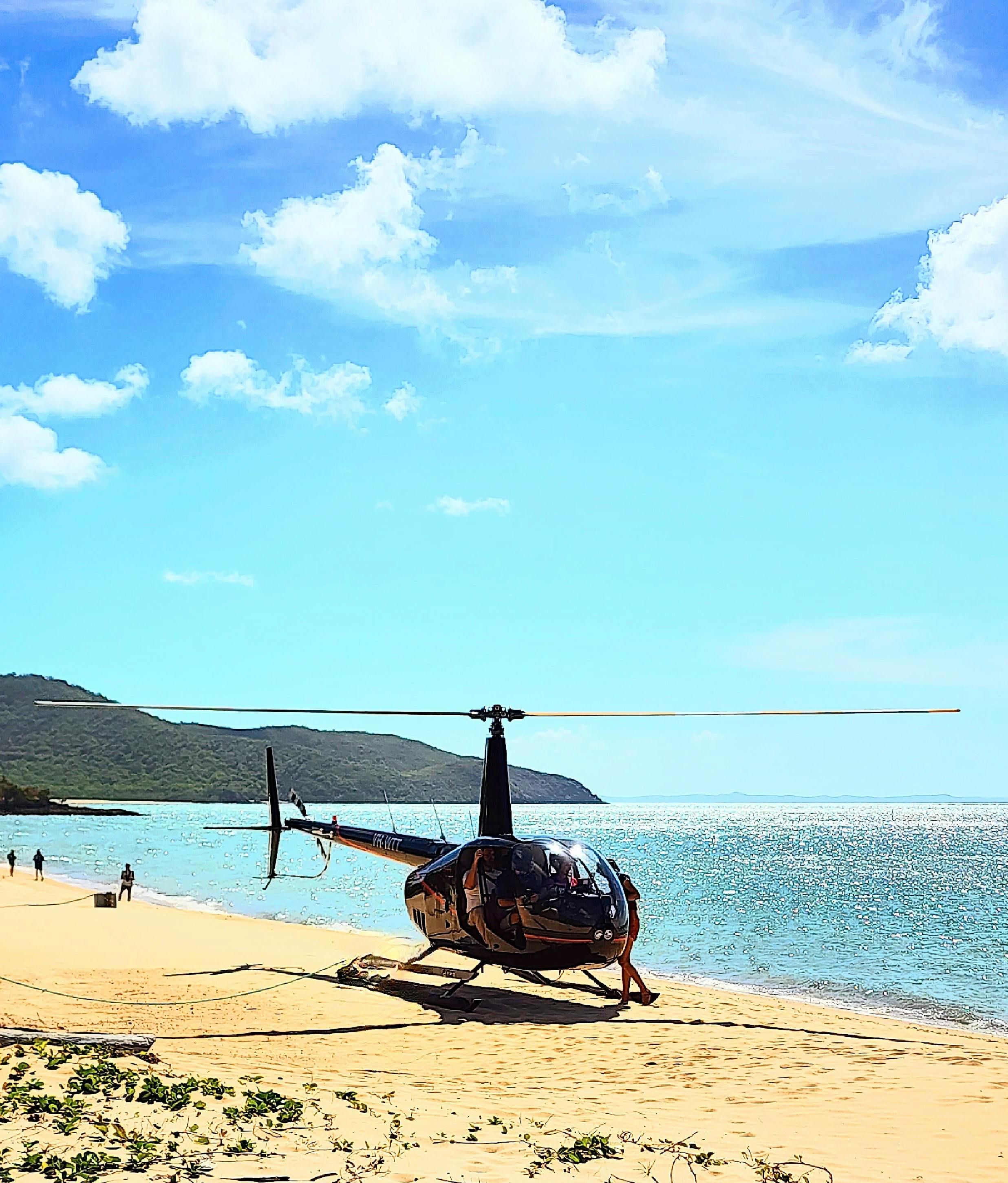 Cape York Tour Helicopter on the Beach at Punsand Bay