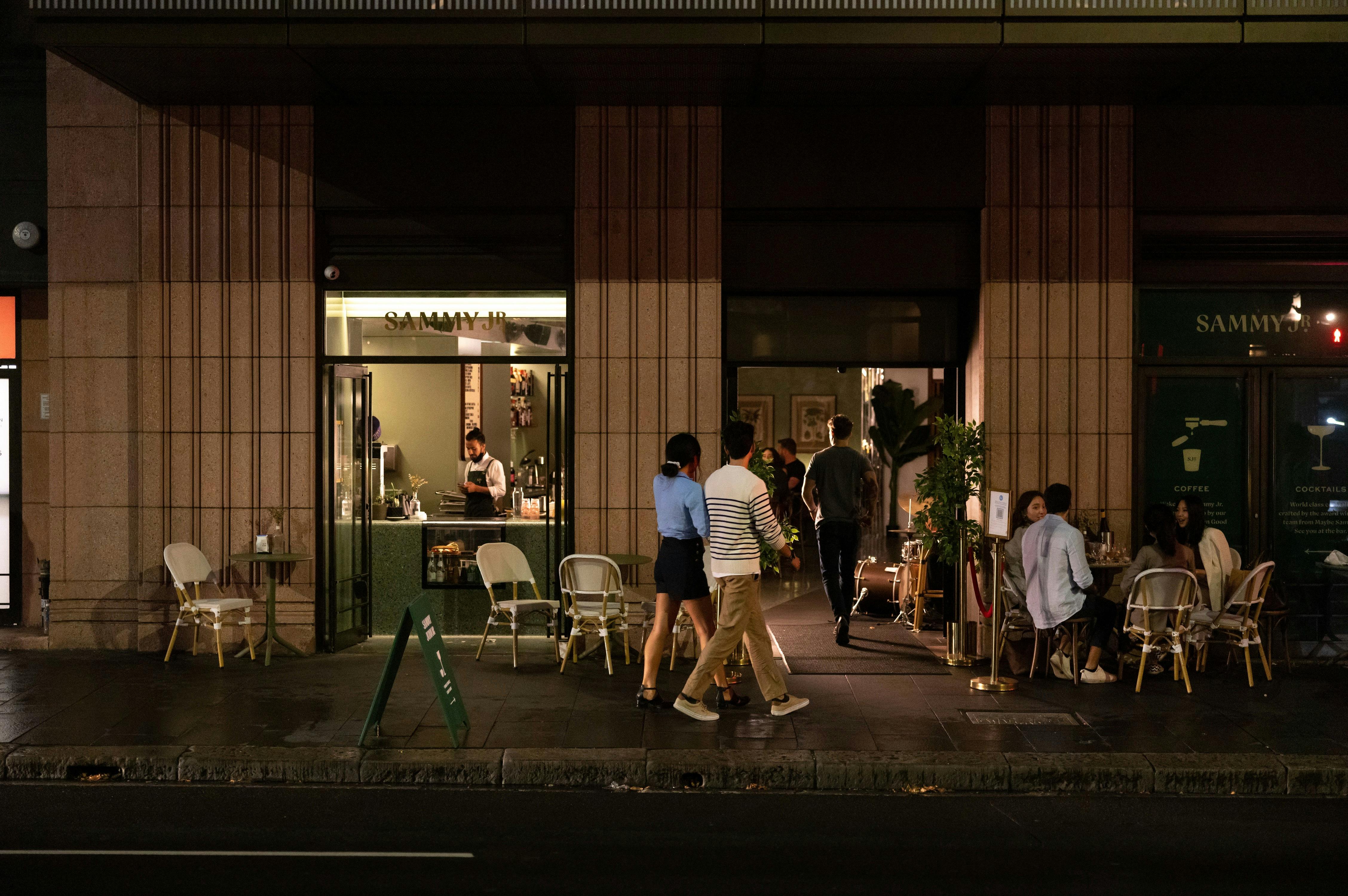Couple entering Sammy Junior in Sydney's CBD