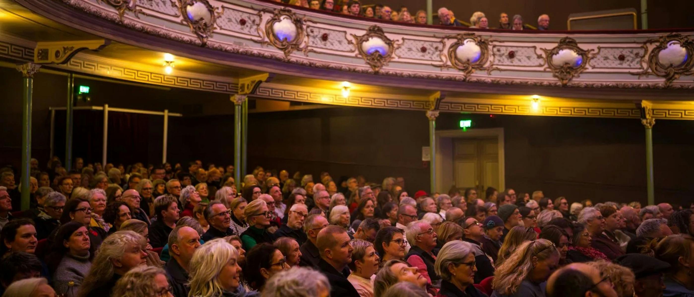 An audience of people sitting in rows at the Theatre Royal, Hobart.