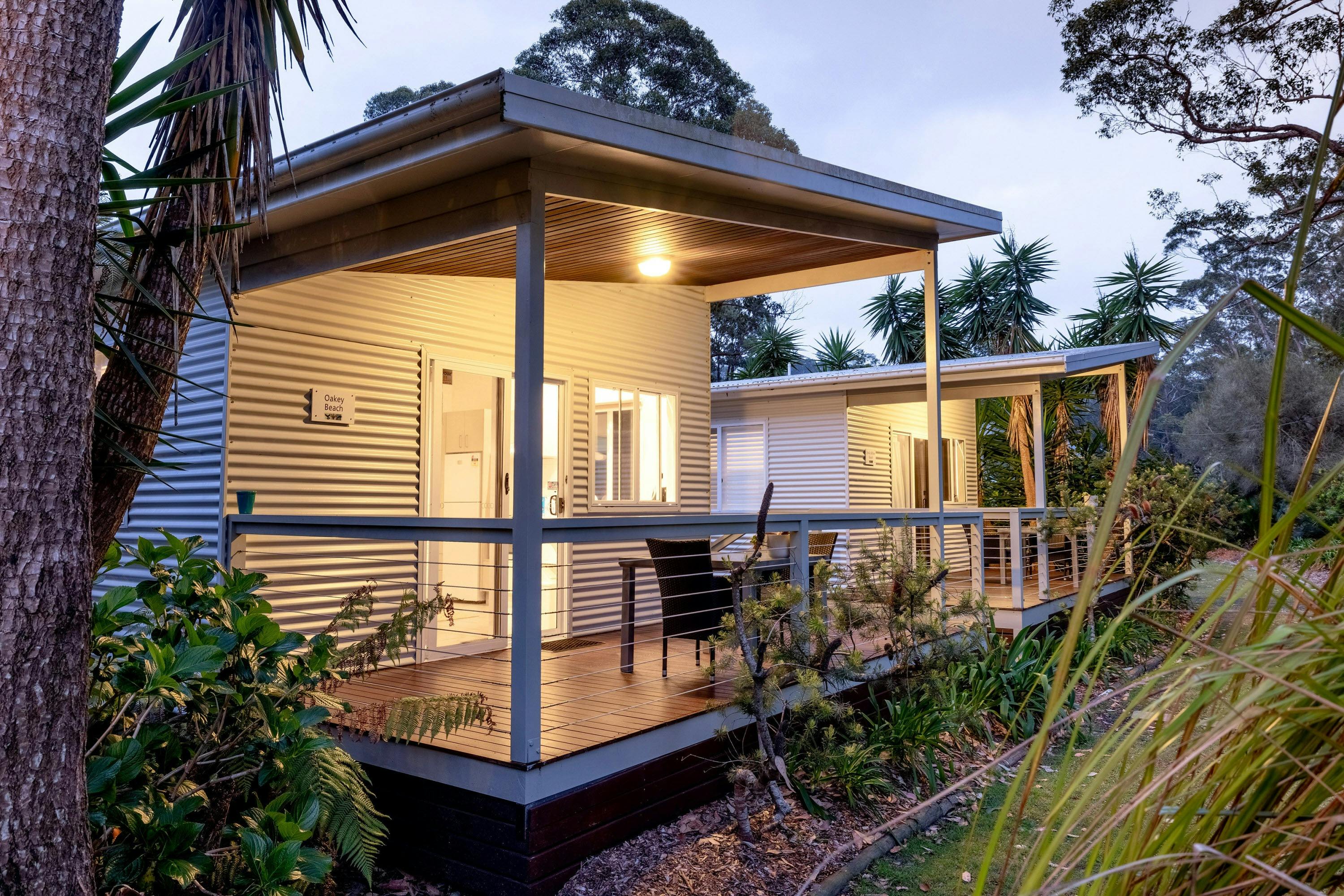 In this picture is a One Bedroom Villa with a deck and seating