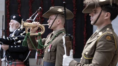 Bagpiper and bugler during sounding of the last post