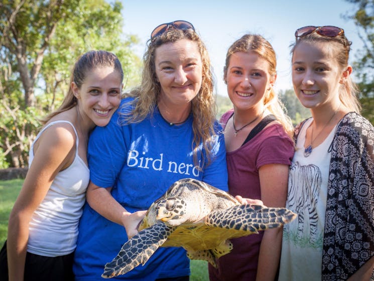 Team at Seabird Rescue holding a turtle
