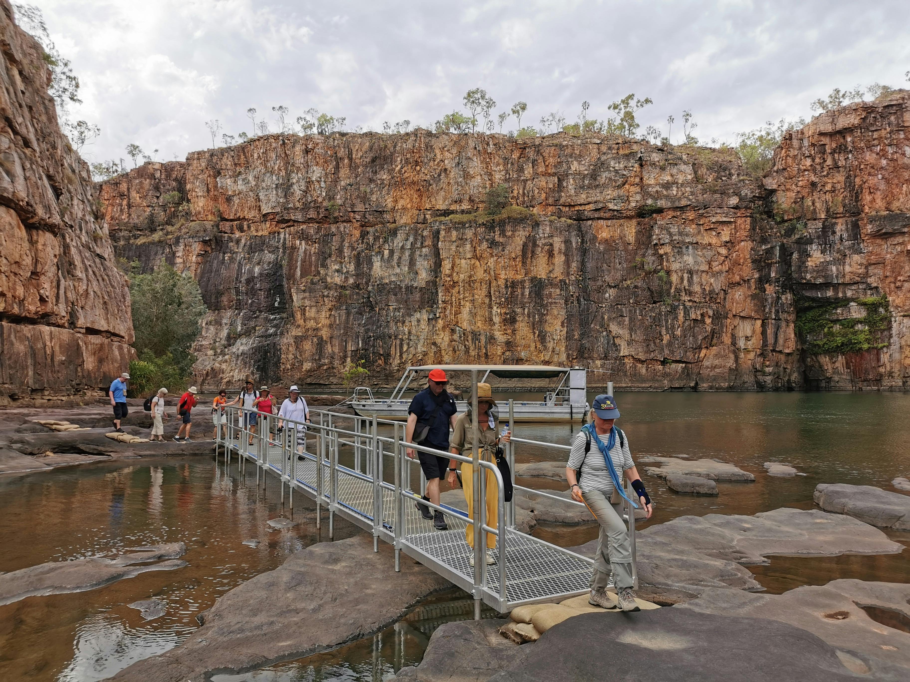 Visitors disembarking the cruise ship with the Gorge walls in the background