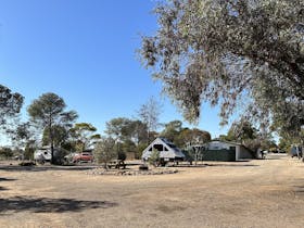 A view of some caravans and the scenery at the park