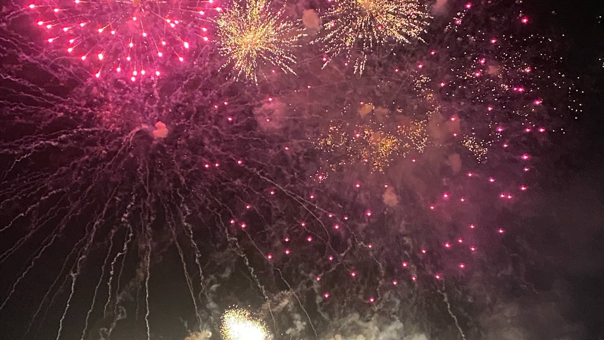 Watch the fireworks from a boat