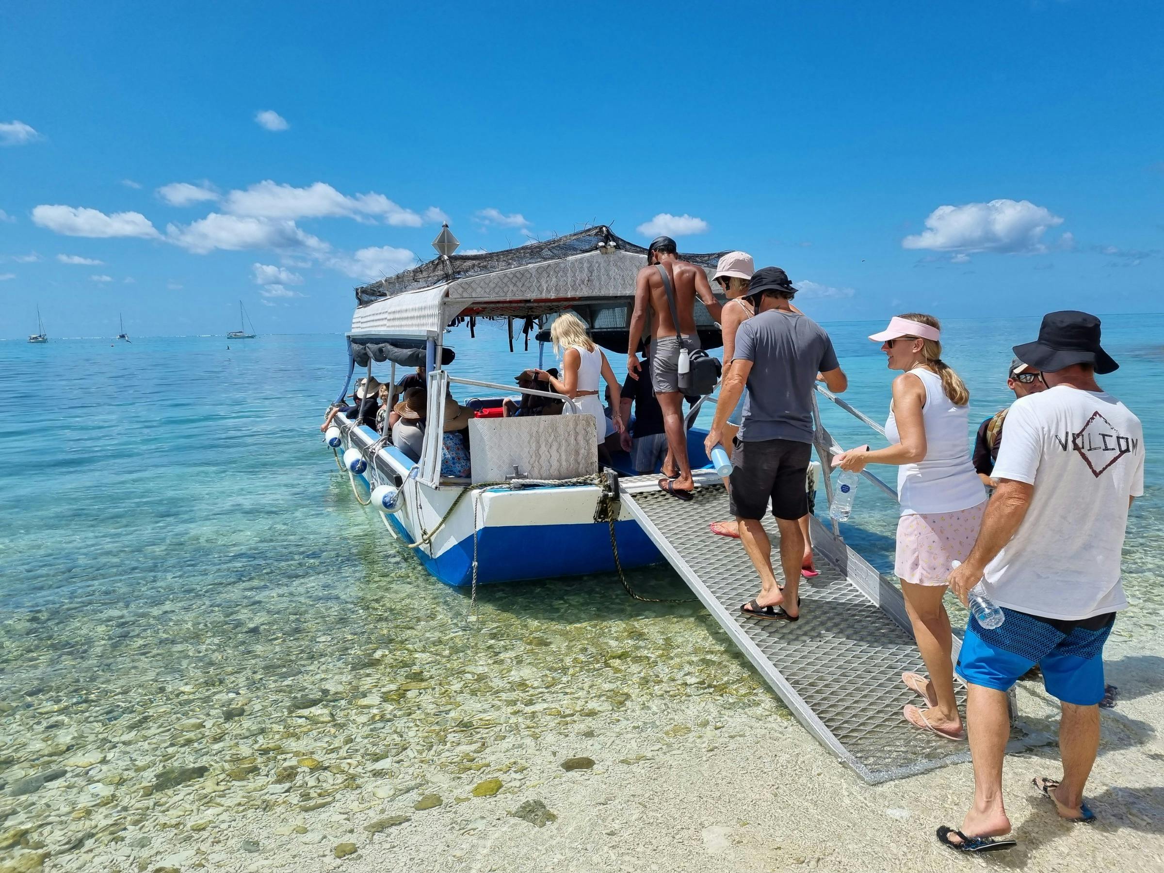 See the reef while staying dry on board glass bottom boat ' Musgrave Magic'