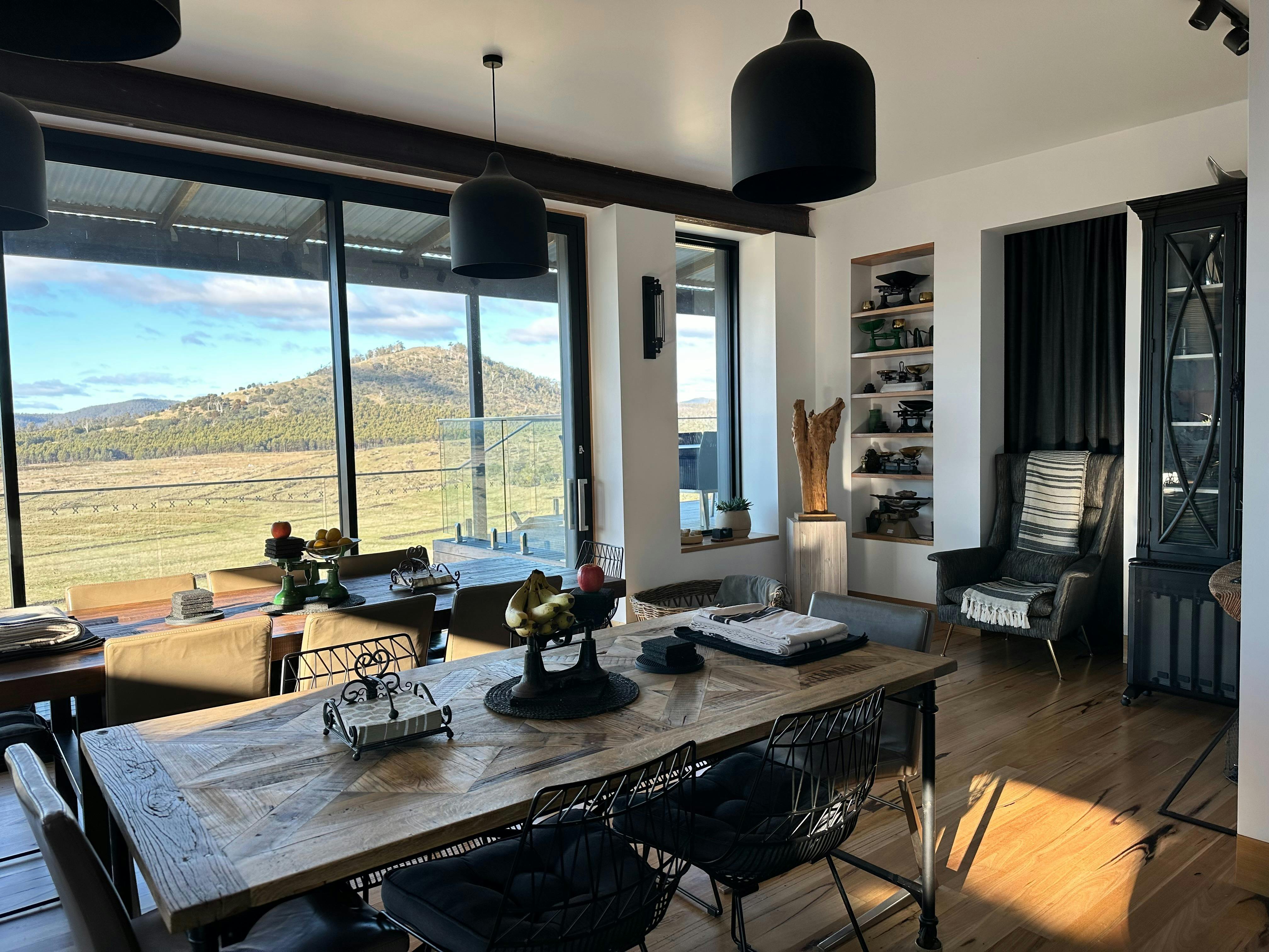 Wall to ceiling windows with lovely dining space that can seat 20 people.
