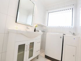 Bathroom, complete with washing machine