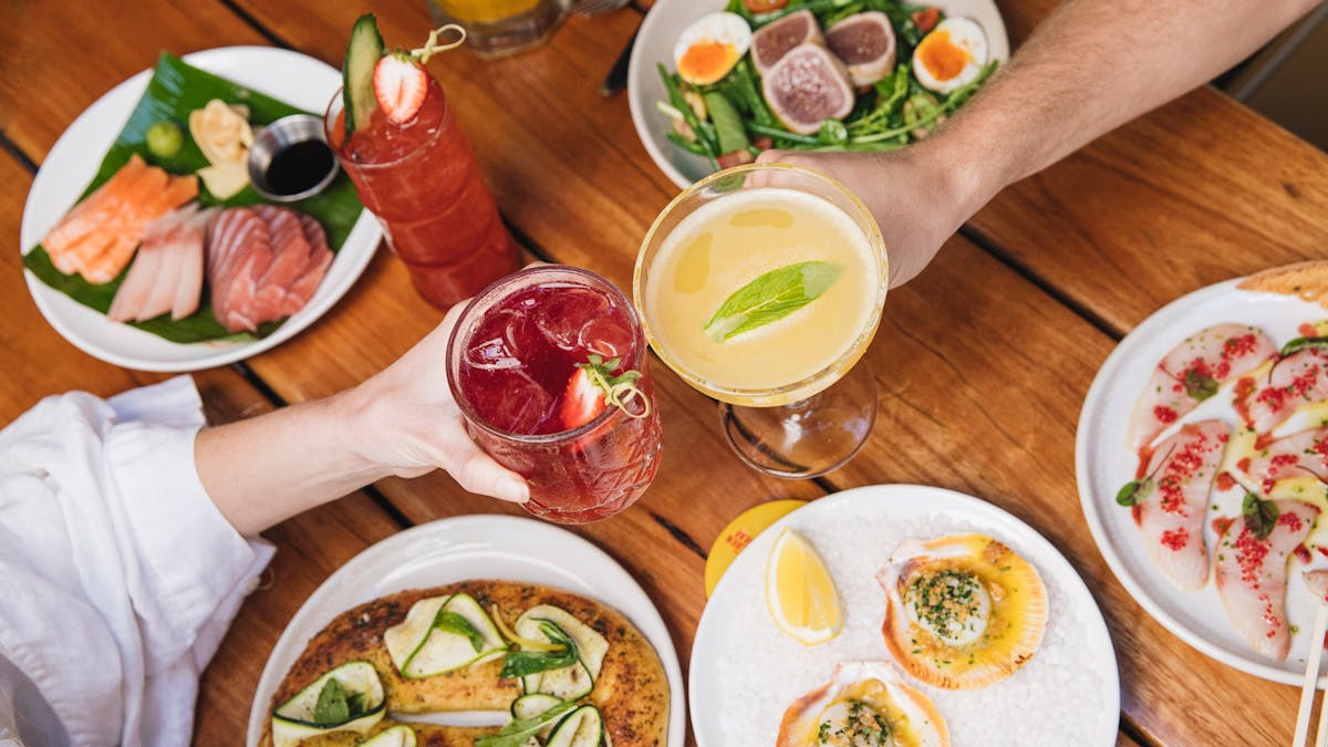 Cheers above food