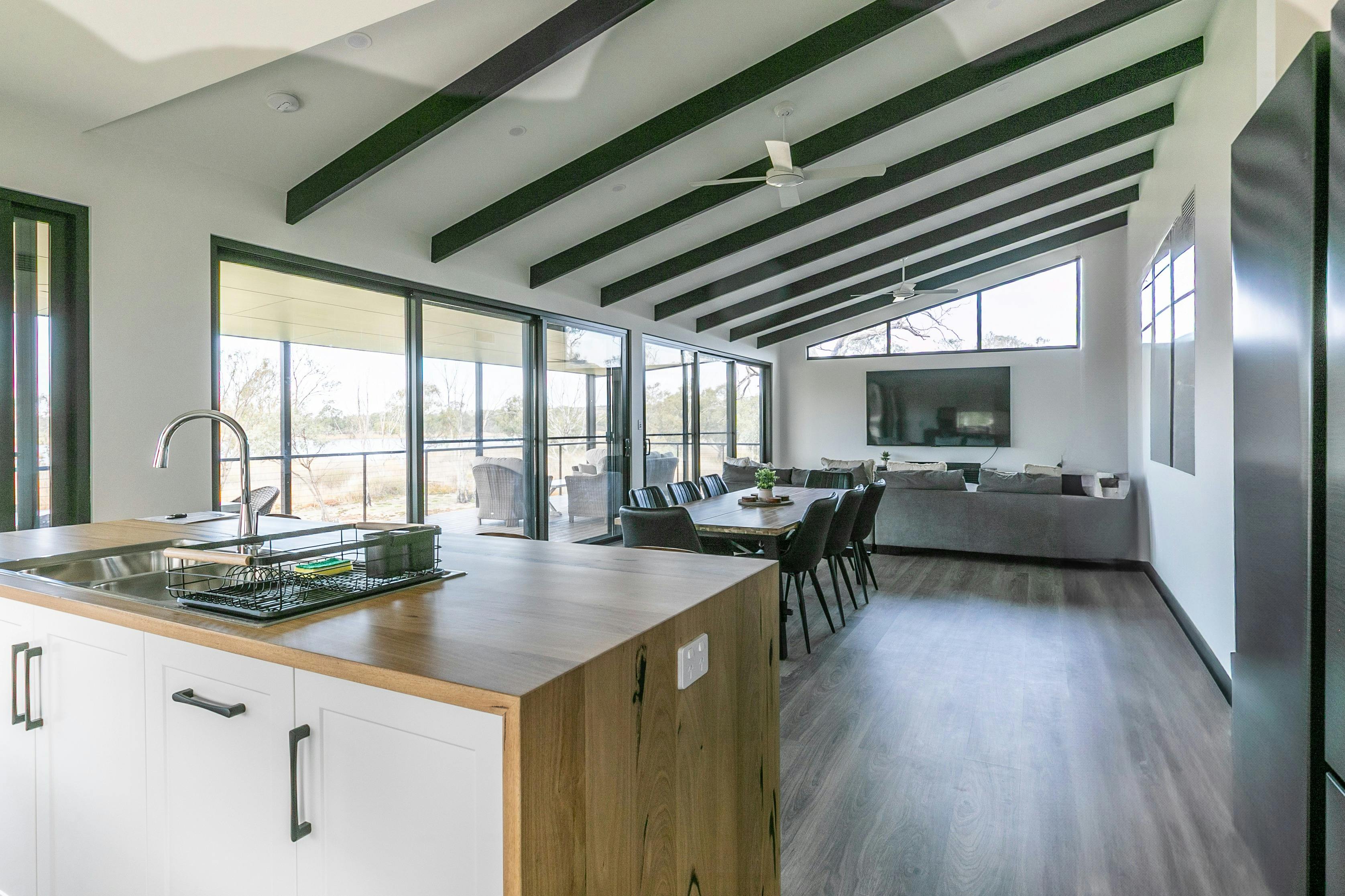 spacious kitchen and lounge area with views