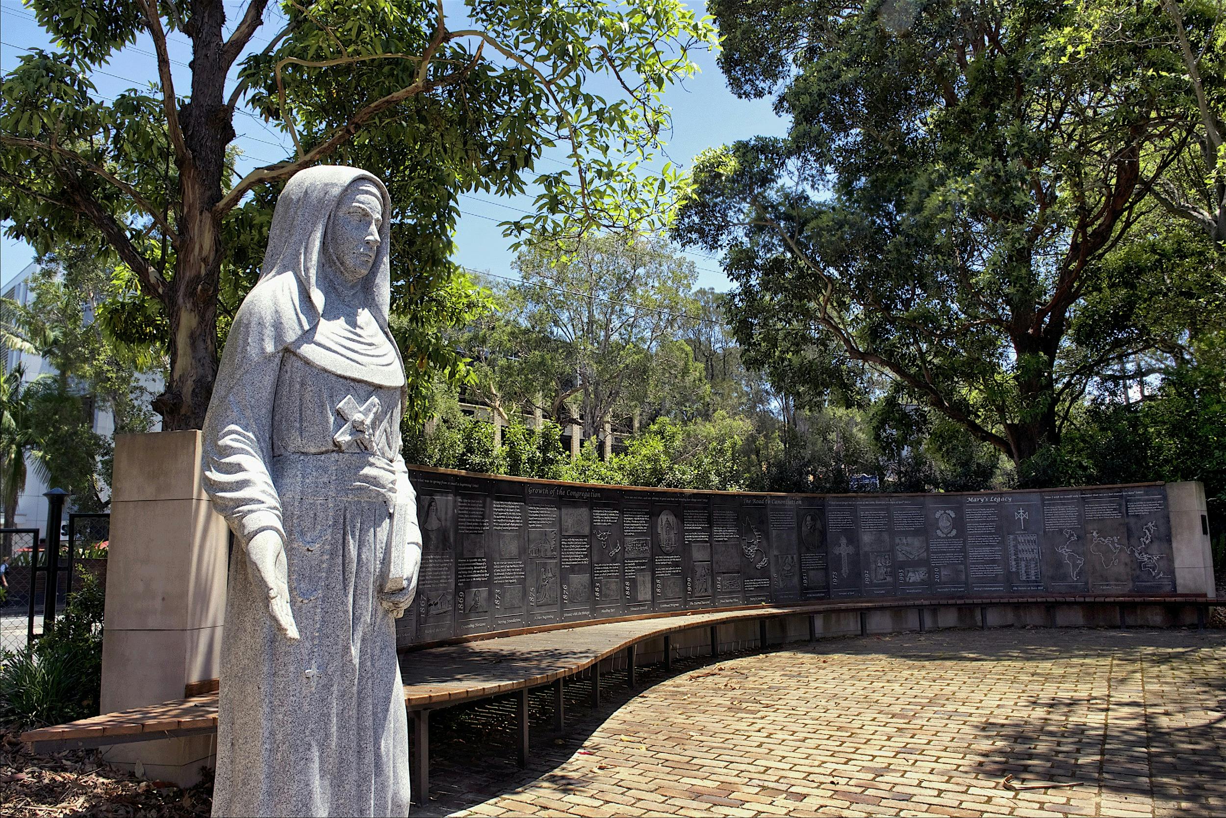 memorial walkway with statue at the foreground