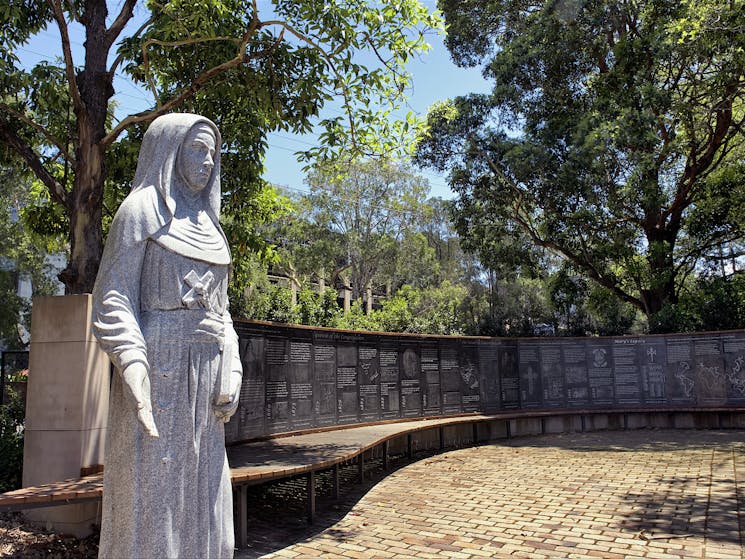 memorial walkway with statue at the foreground