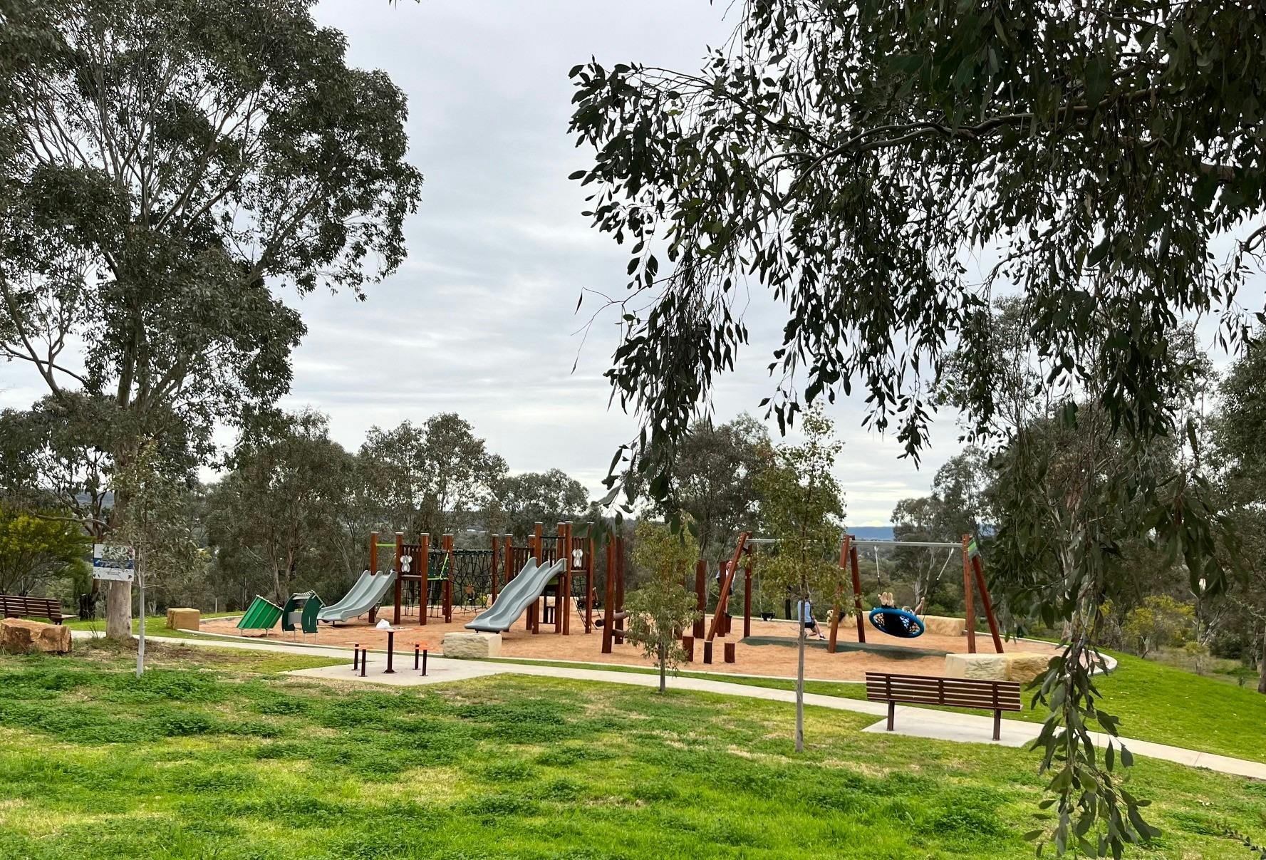Playground framed in gum trees