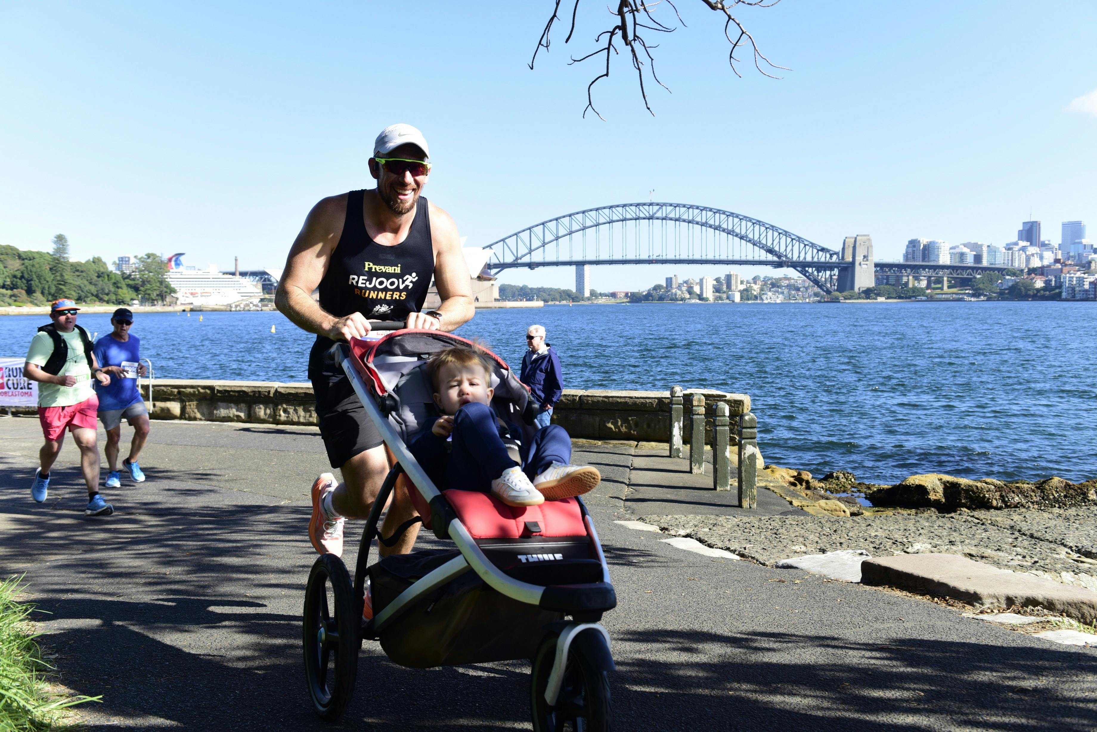 sydney harbour and man with pram