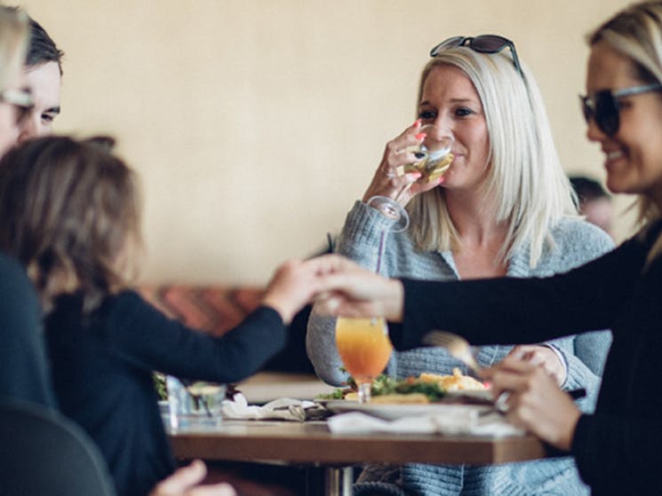 Customers enjoy food and drinks at Camden Hotel