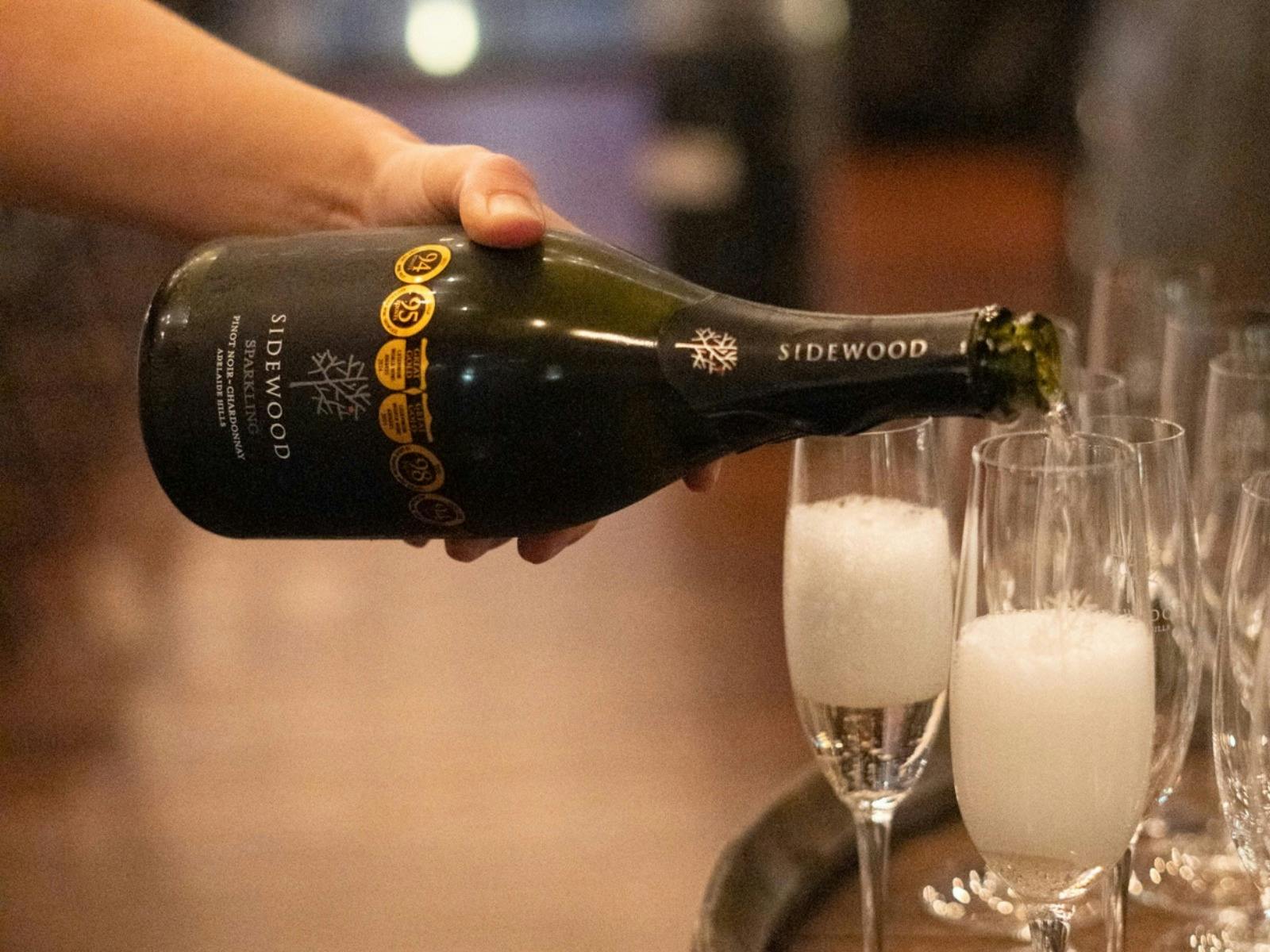 Glass of sparkling on arrival