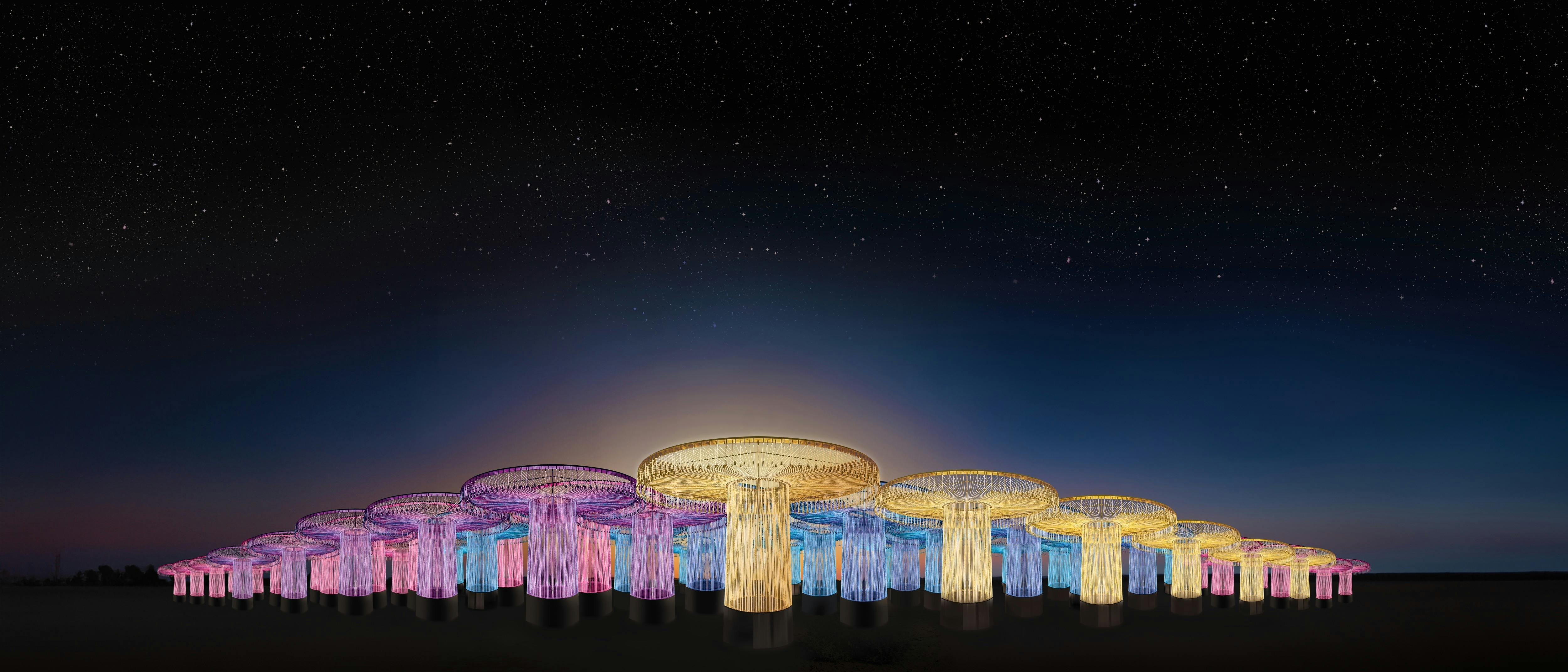 Photo of a night sky with lit up hills hoists at Sensorio