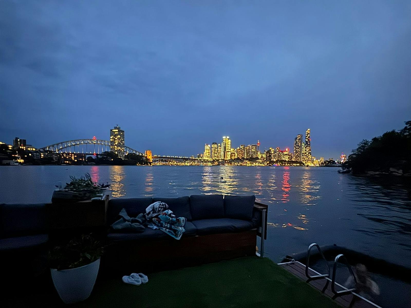 City lights at dusk from the sauna boat