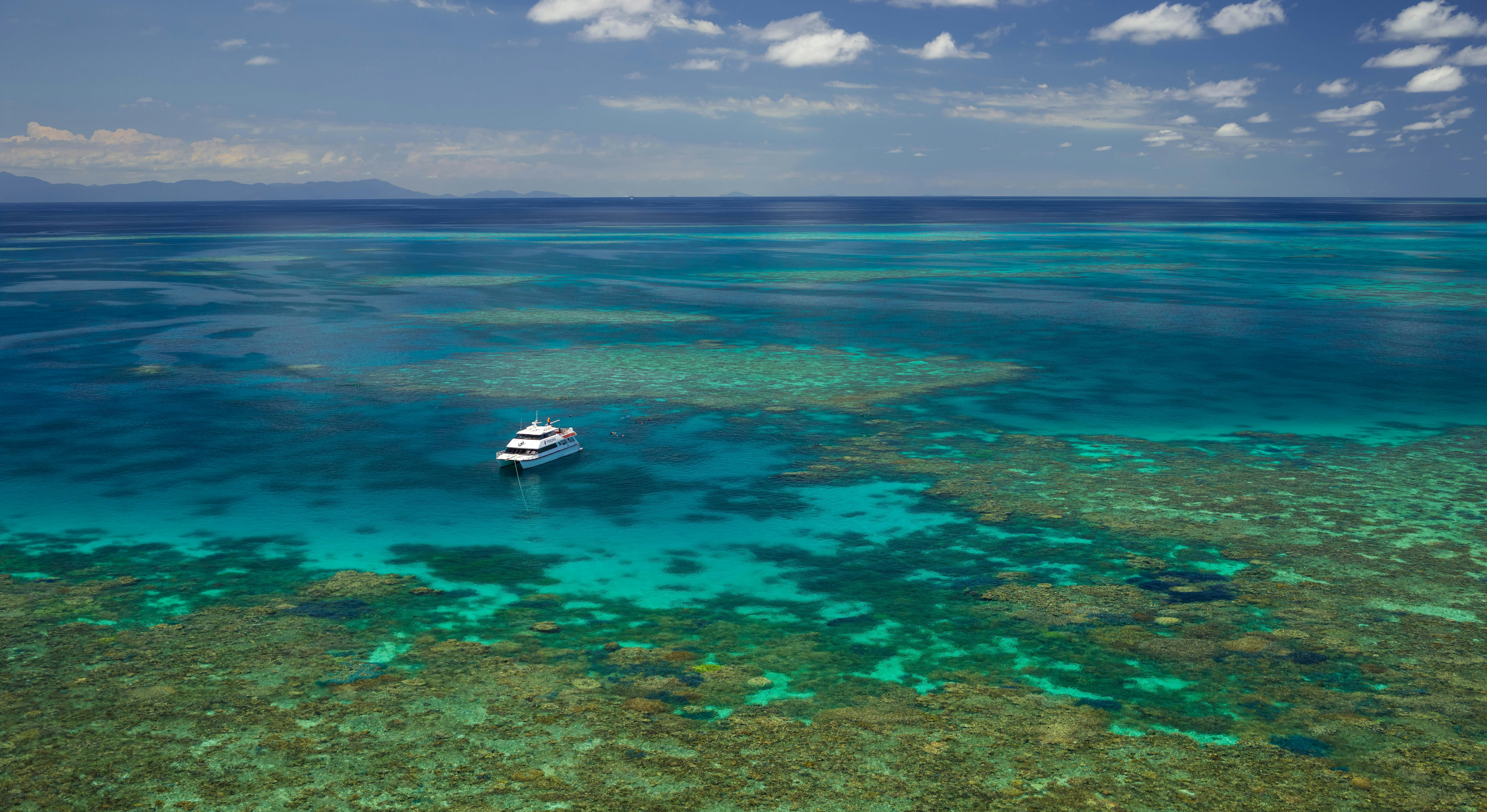 Poseidon moored at reef