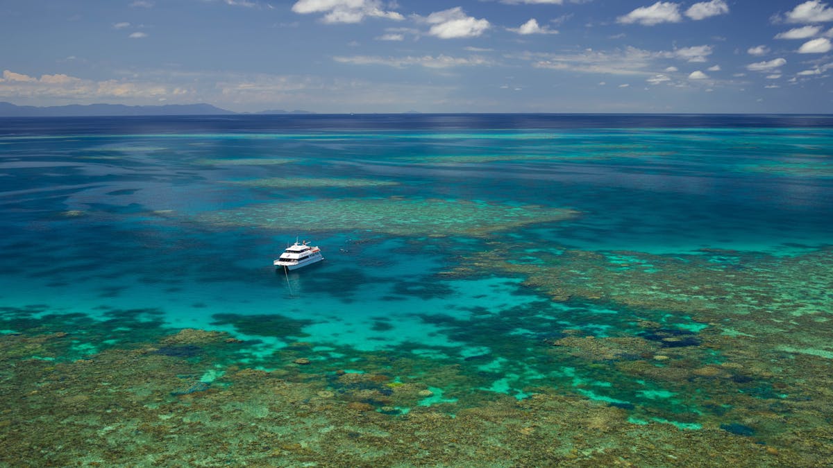 Poseidon moored at reef