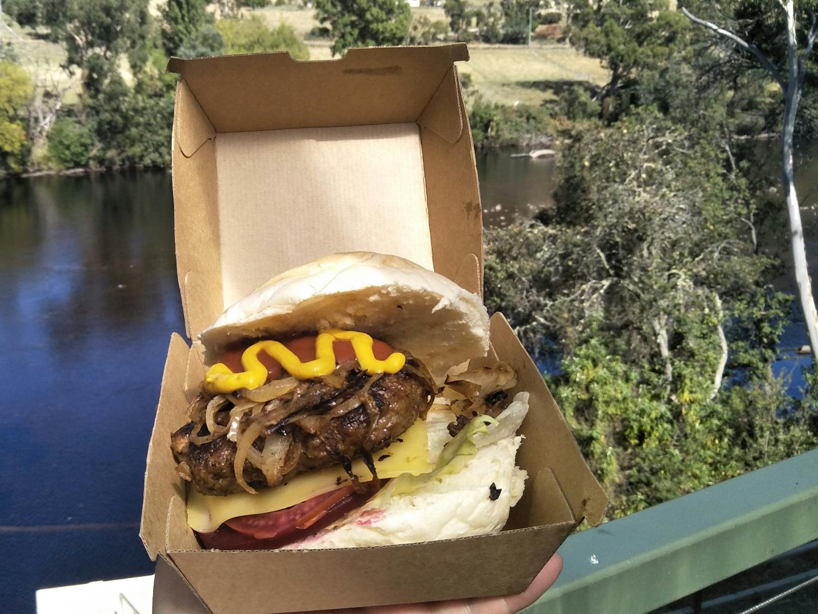 The Judbury Burger in front of the mighty Huon River. Judbury Market Calvert Park Judbury.