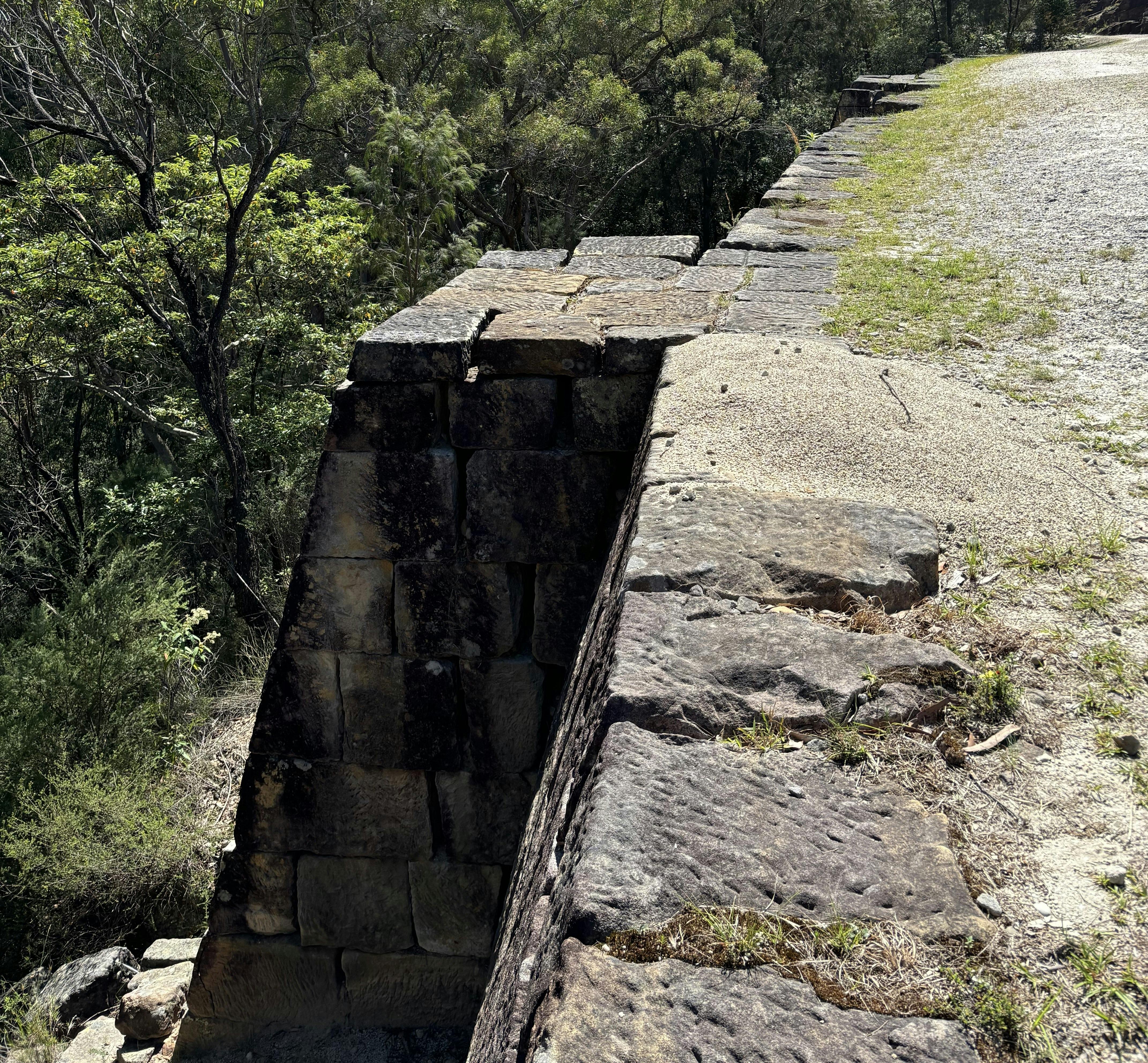 Huge sand stone buttress and wall supporting a convict built road.