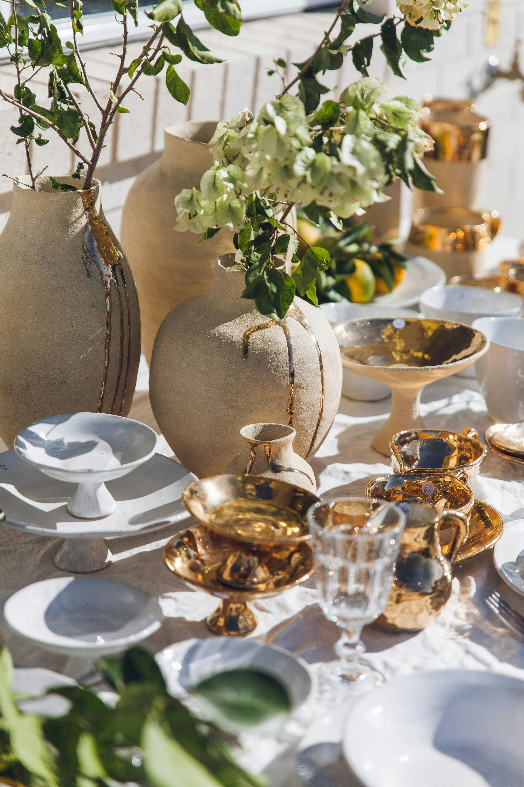 Table setting with ceramic vases
