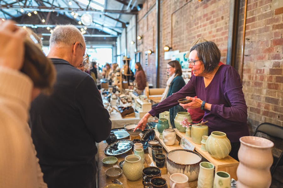 people at the market stall