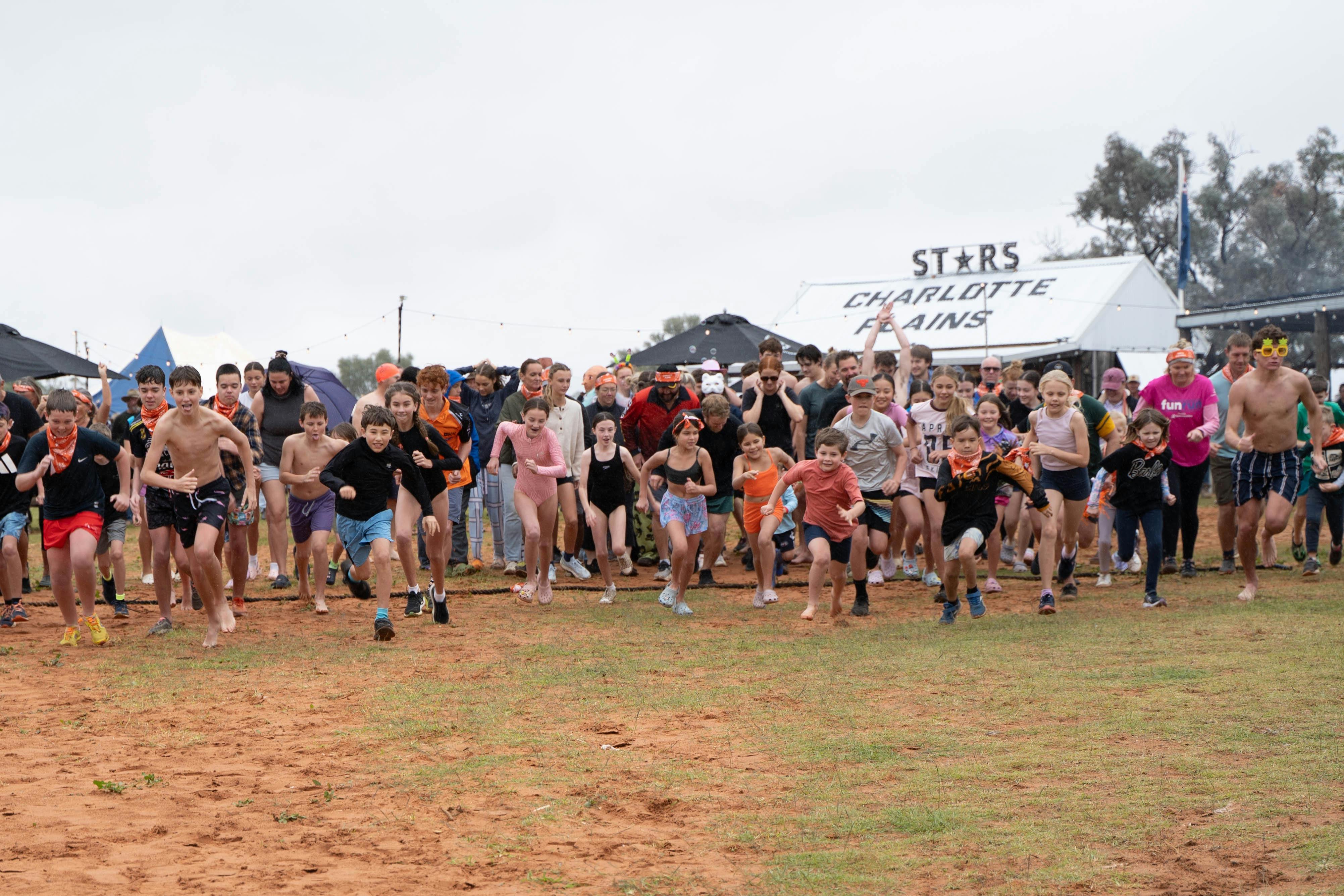 Festival guests taking off for the fun run at Charlotte Plains, Outback Queensland