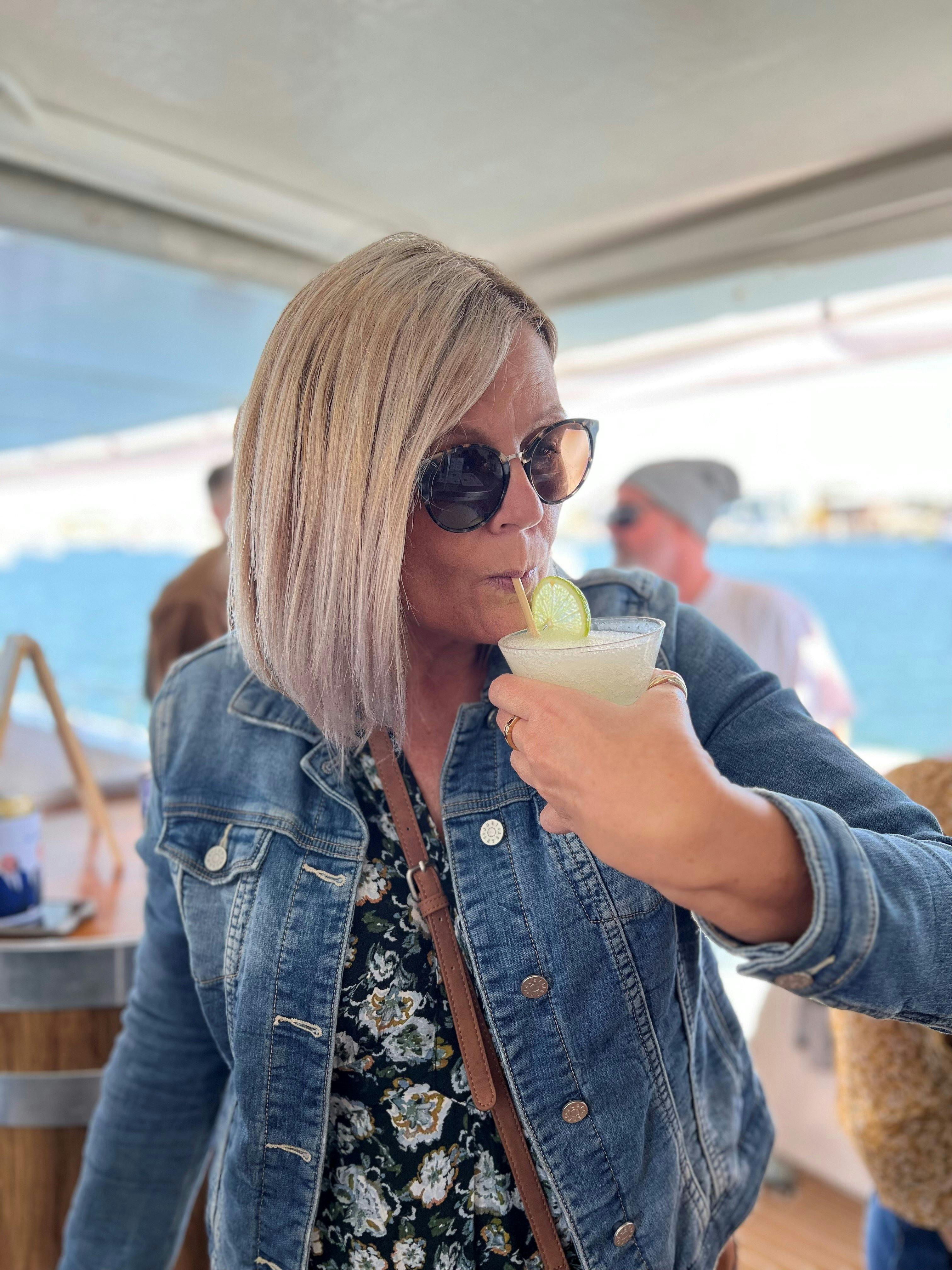 Enjoying the cocktail on board