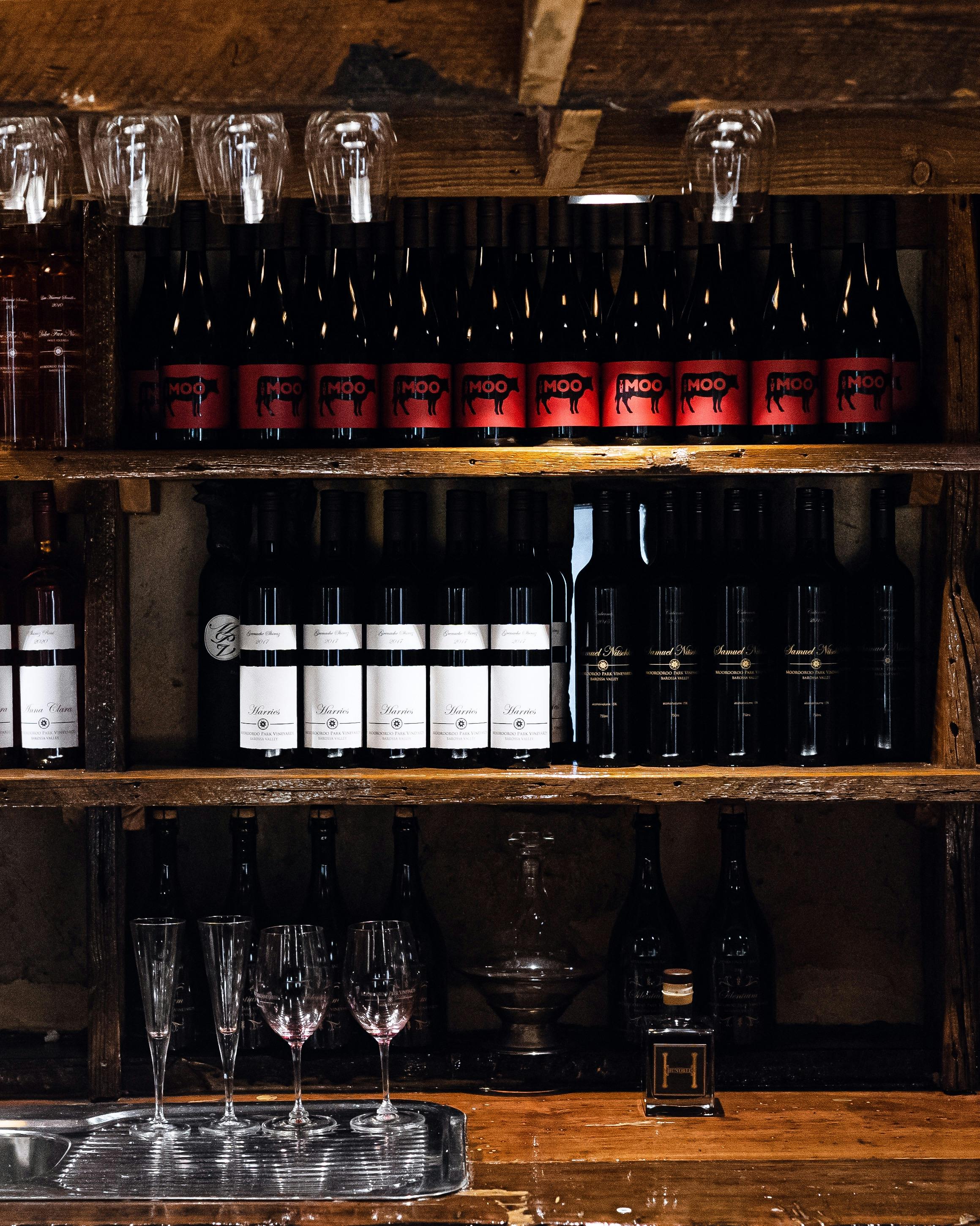 Bottles on cellar shelf