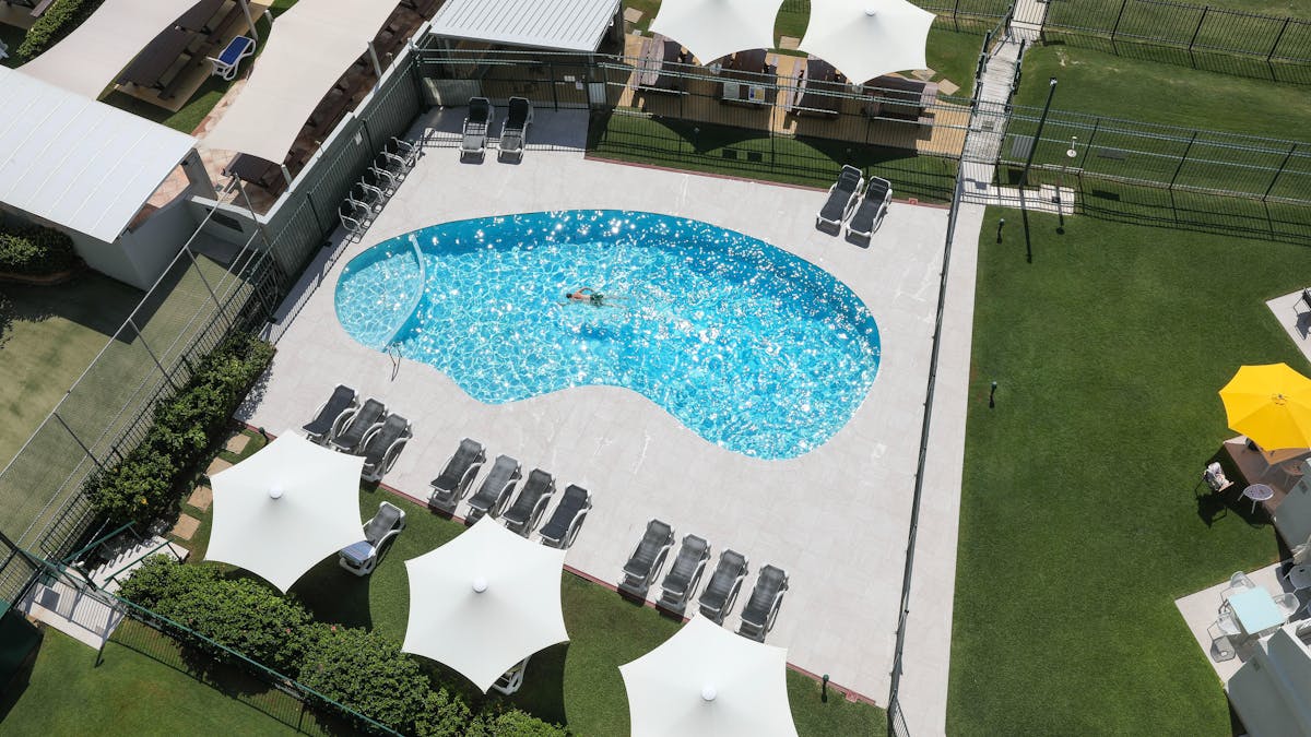 The newly renovated pool overlooks the ocean