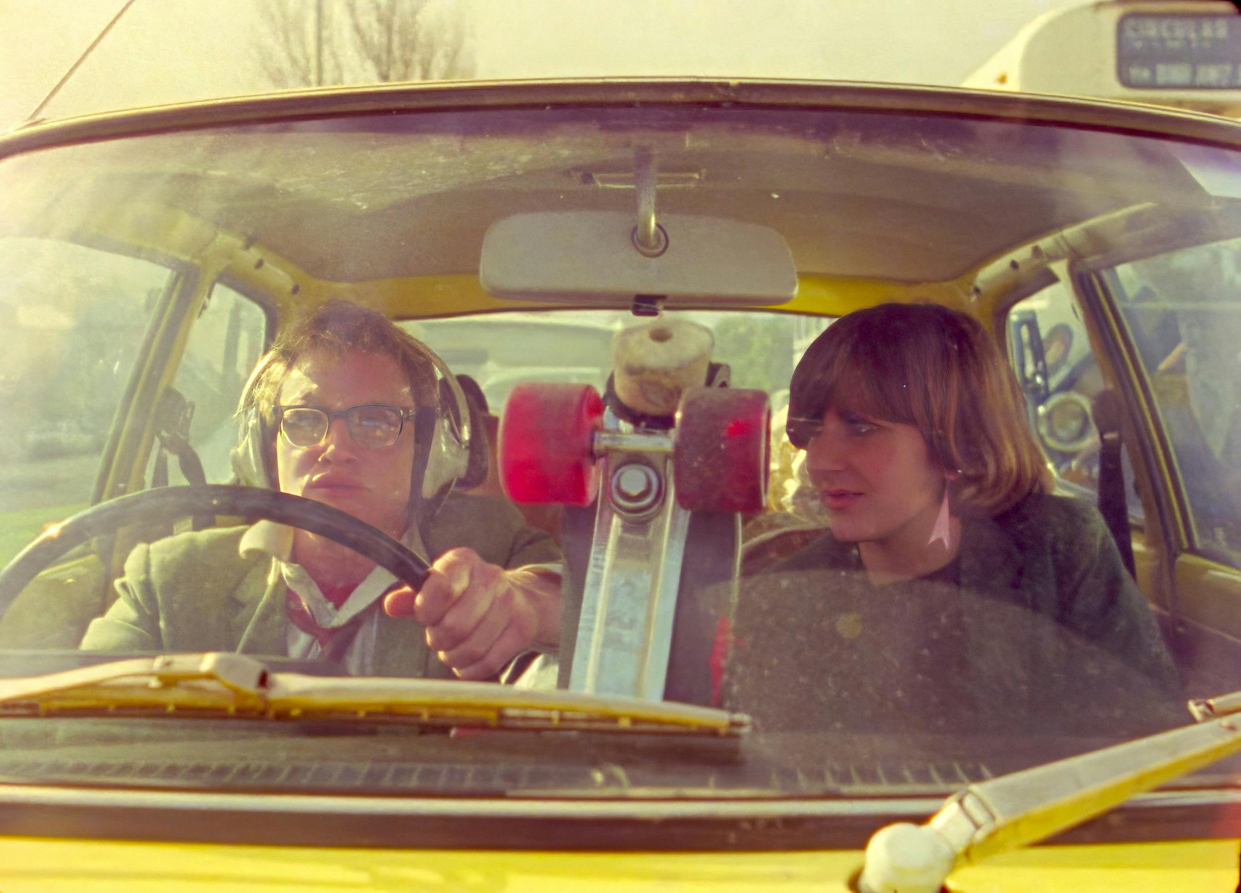 two people in a car