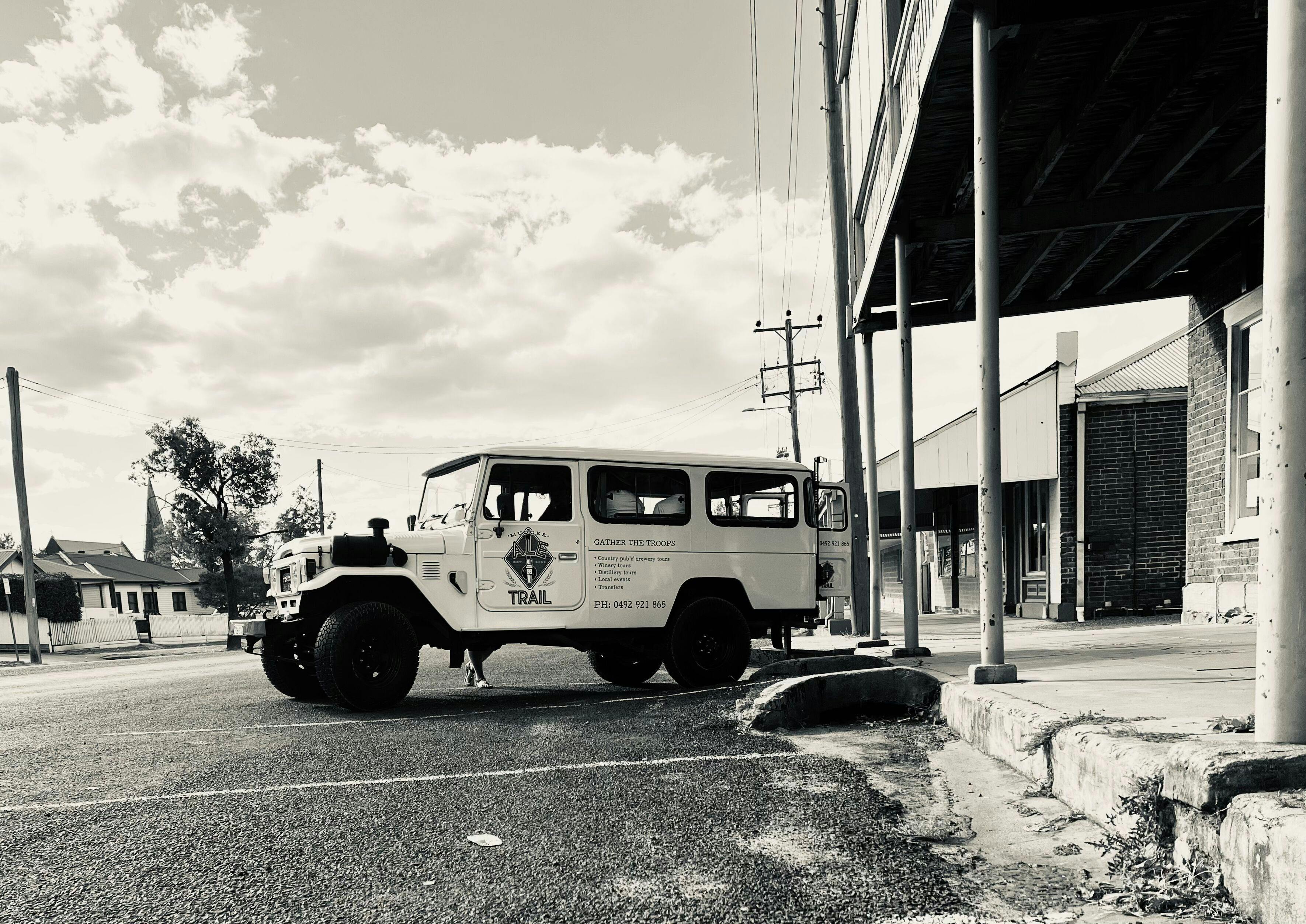 Low angle of Mudgee Ale Trails' Troopy vehicle in sepia tones