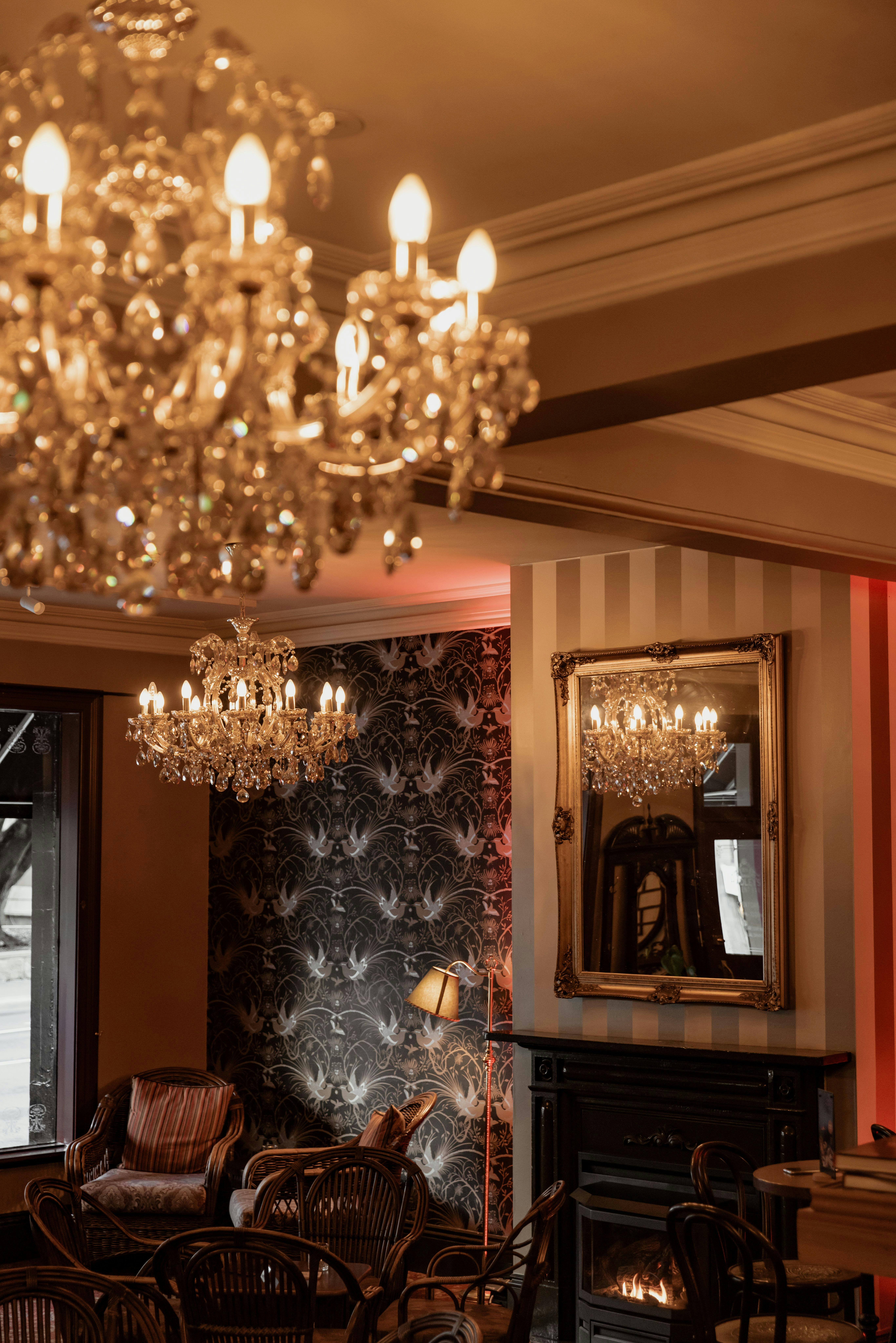 Chandeliers and fireplace in the Orient Bar