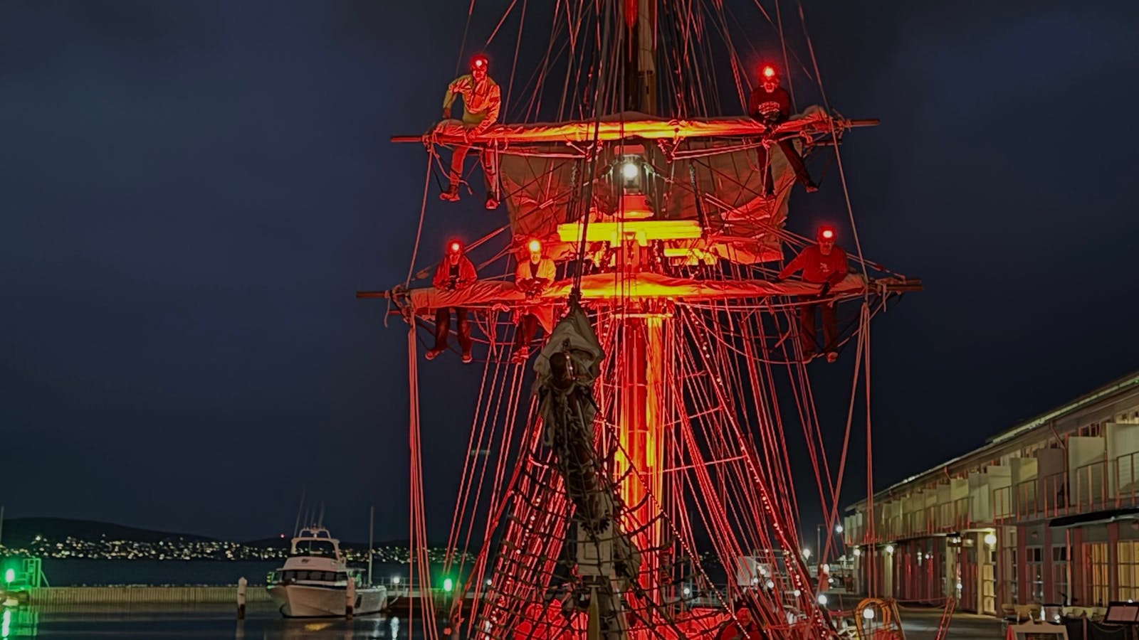 Crew members preparing the boat for the Redding the sails evening