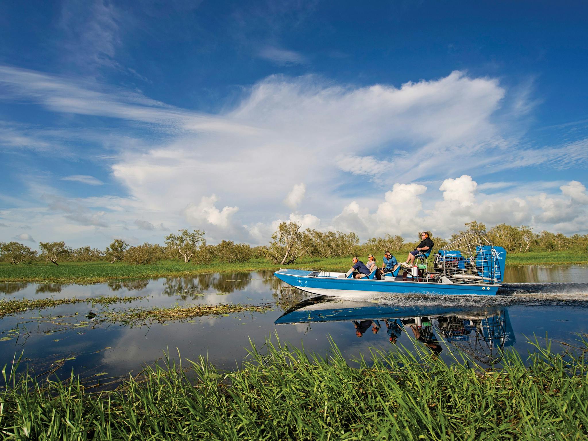 People air boating down Corroboree Billabong