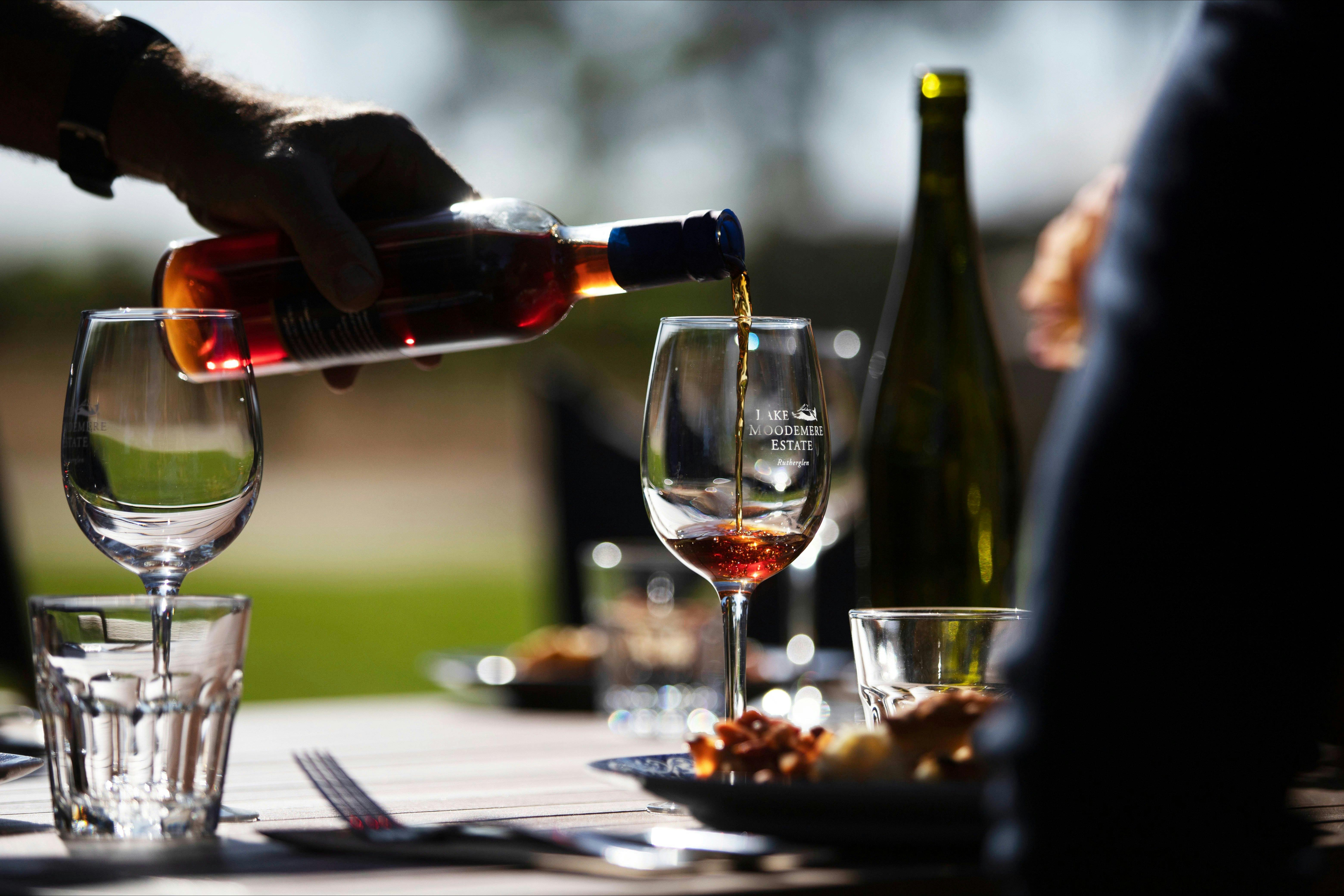 wine being poured into a glass