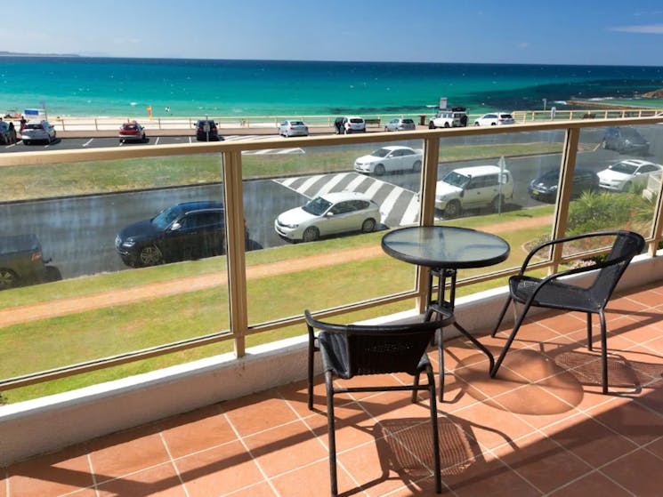 Balcony with beach views and 2 seater setting