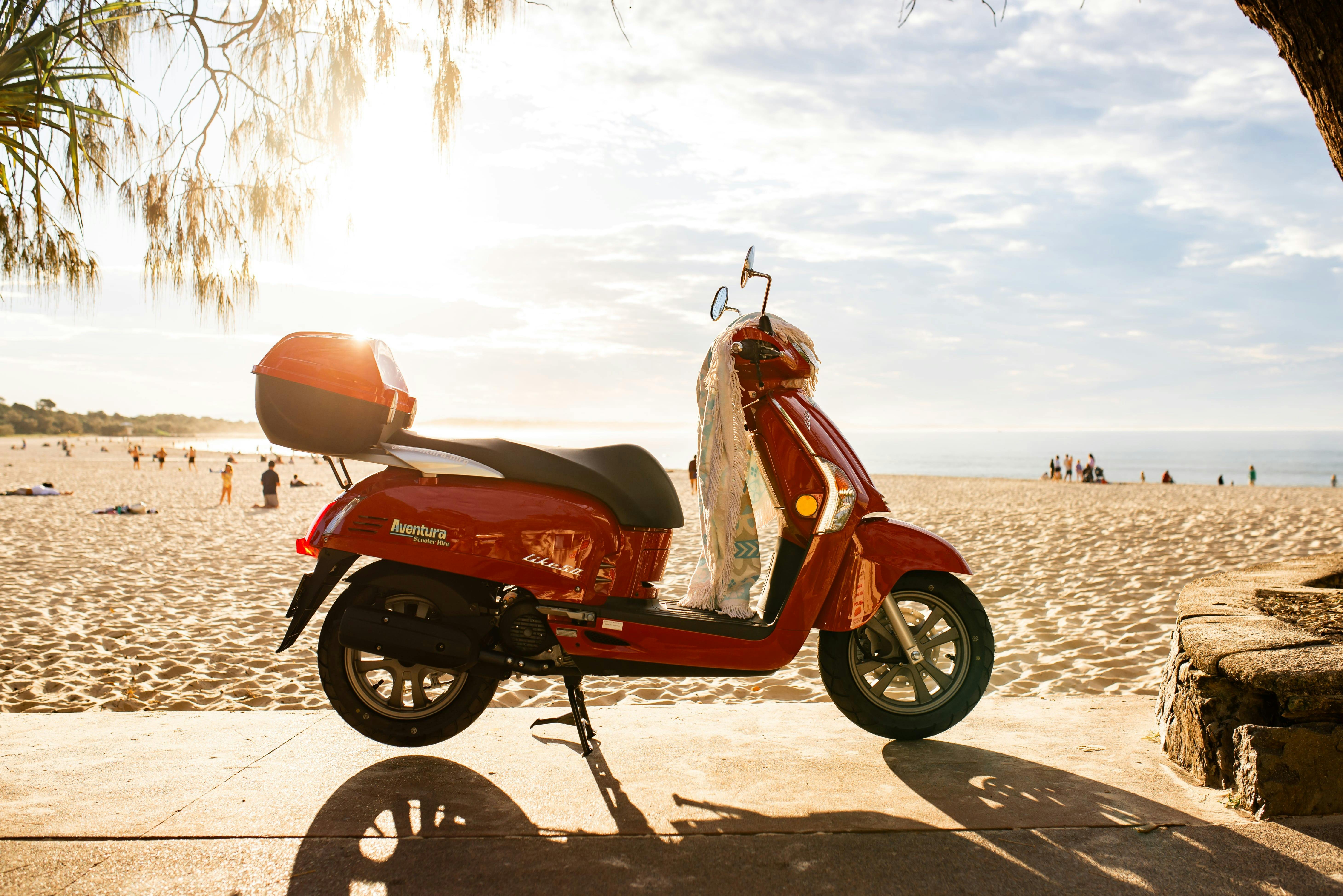 Sunset Scooter ride and swim at Noosa Main beach