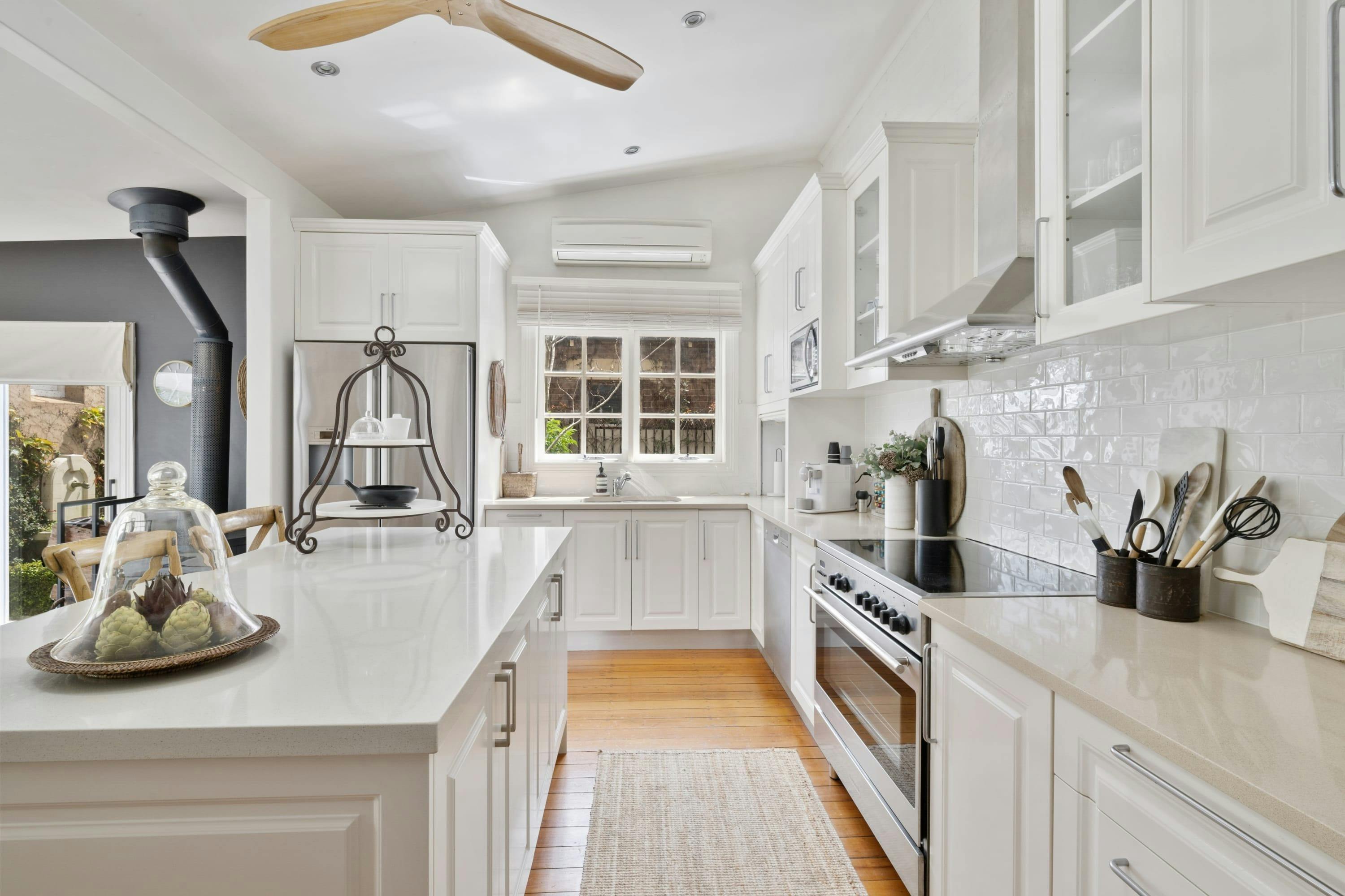 Kitchen with appliances and amenities