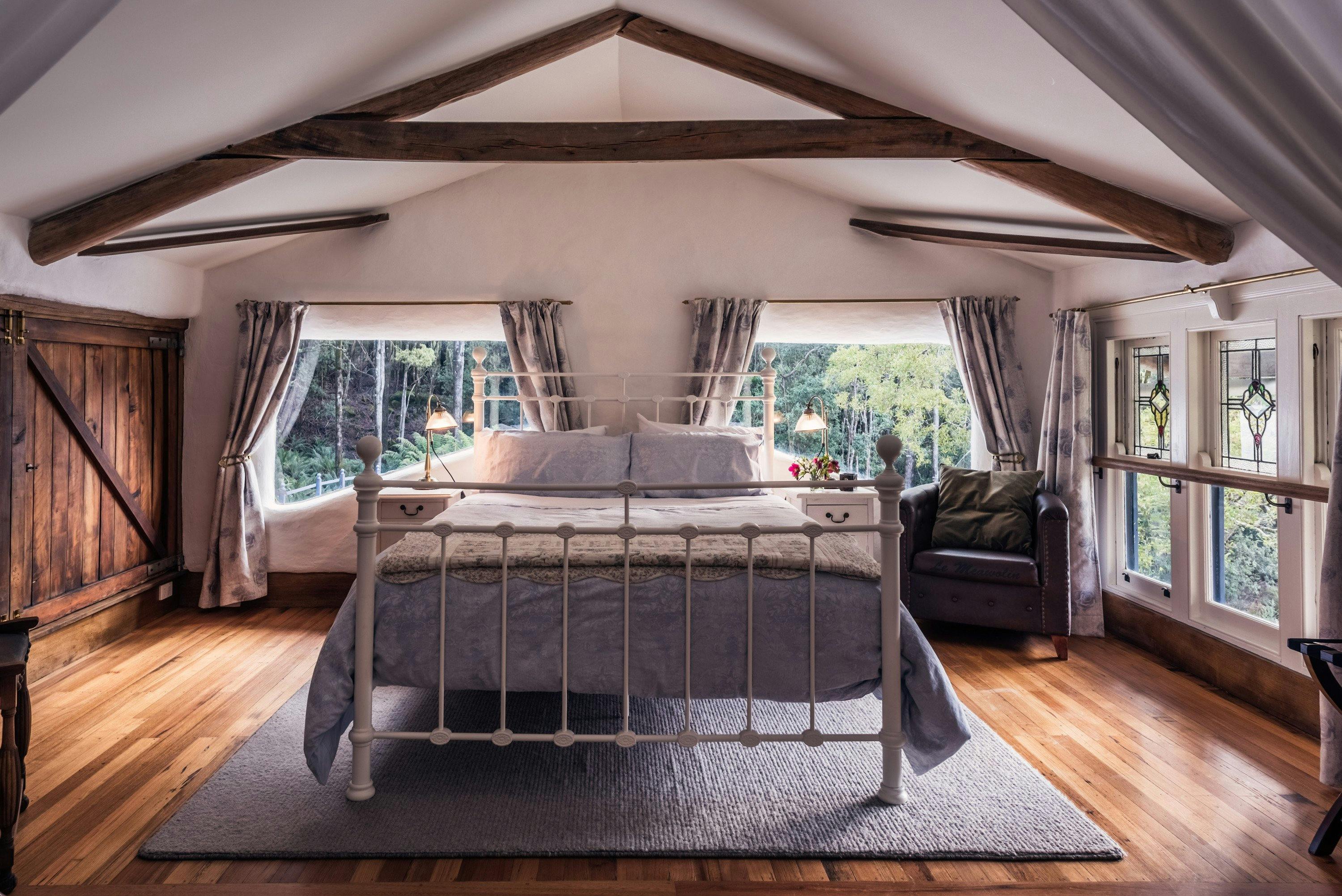 Sleep peacefully on luxurious cotton linen with enticing morning views out every window