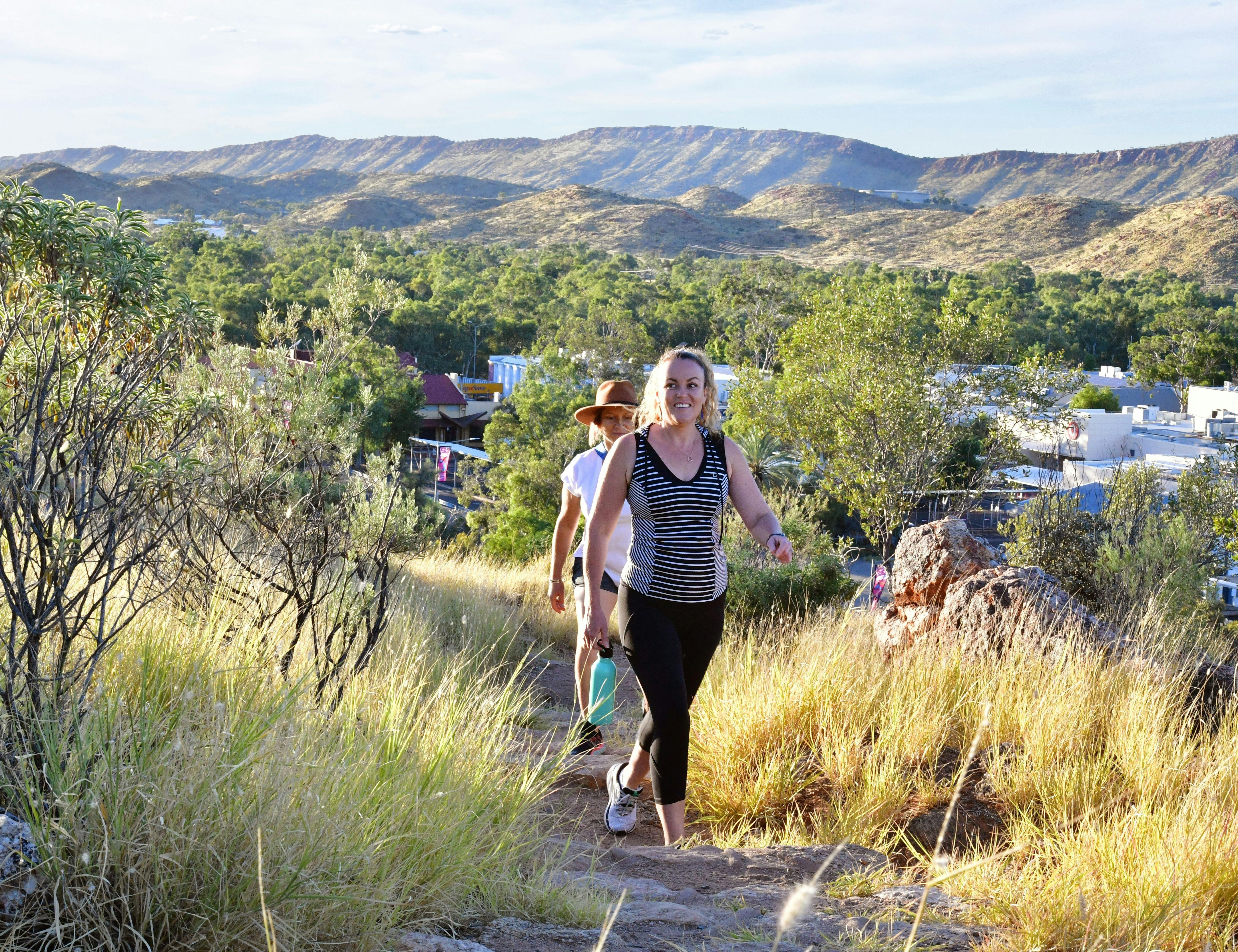 People walking up Anzac Hill in Alice Springs