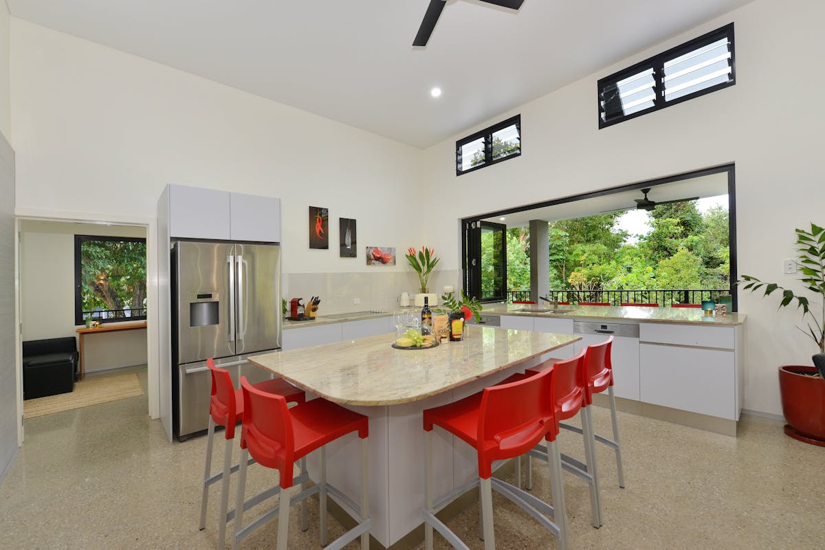 The kitchen is perfect for entertaining with granite bench tops and an open servery.