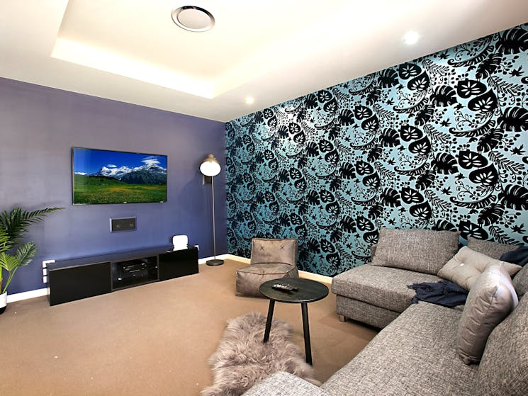 Tv, sofa bed, couch, fluffy rug, foxtel, lamp, wallpaper, stunning, comfortable, monochrome