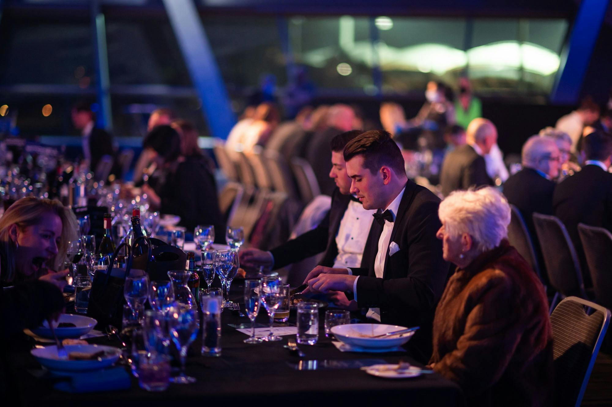 Attendees enjoy meal and drinks at the 125 Years Gala Dinner.