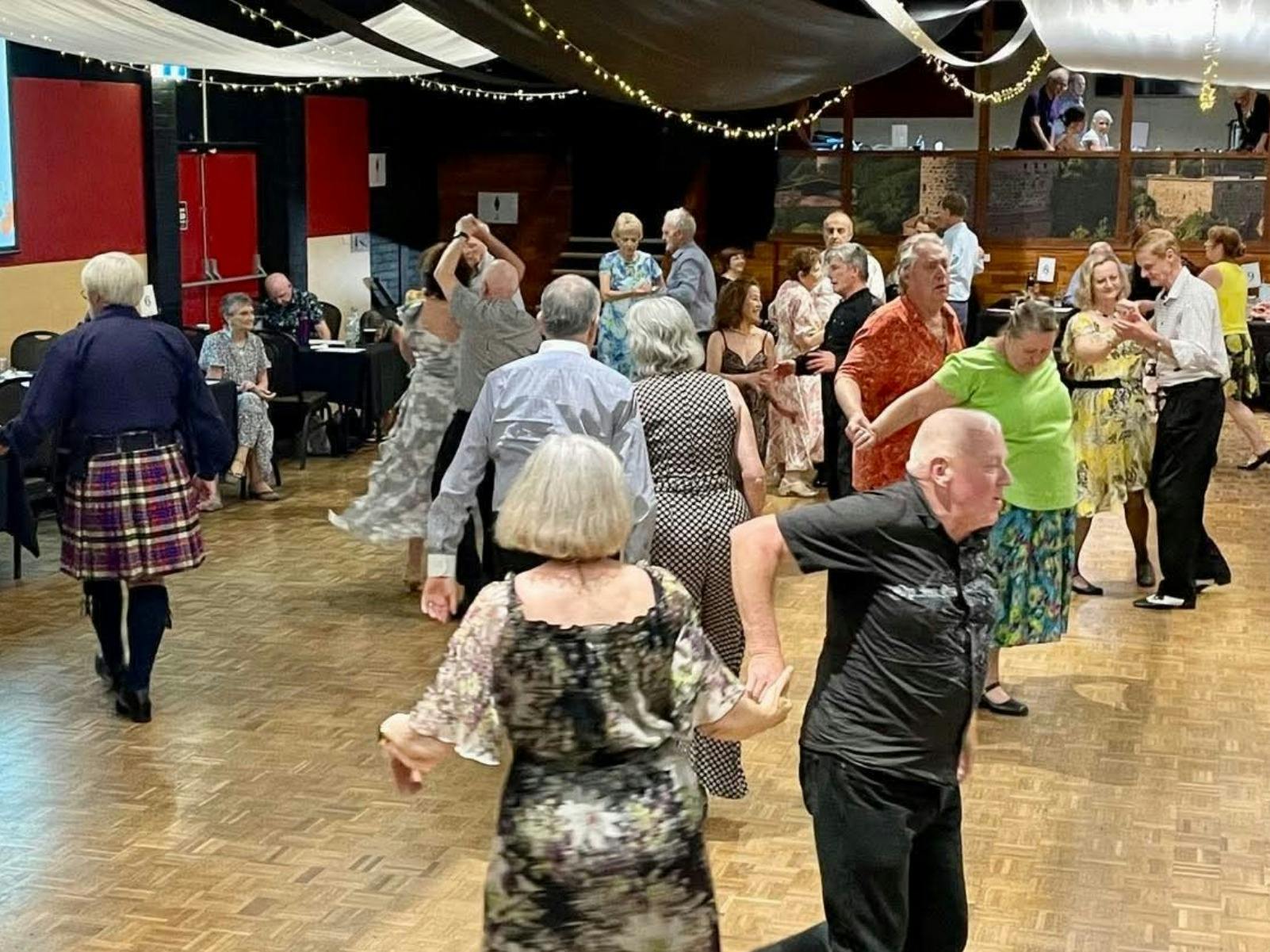 Photo of group of people social dancing in Canberra in the Zeppelin Room at the Harmonie German Club