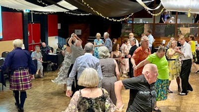 Photo of group of people social dancing in Canberra in the Zeppelin Room at the Harmonie German Club